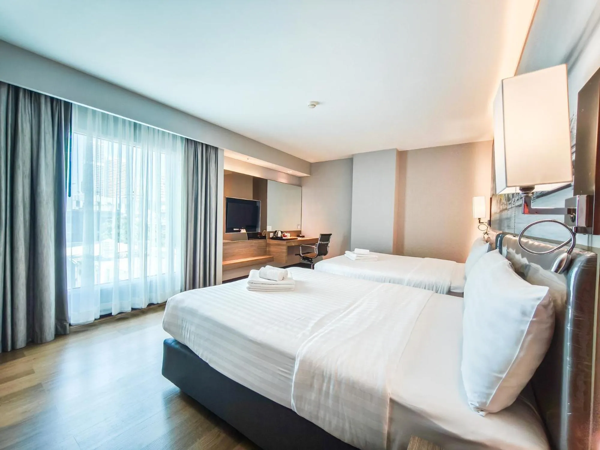 Bed in Citrus Sukhumvit 11 by Compass Hospitality