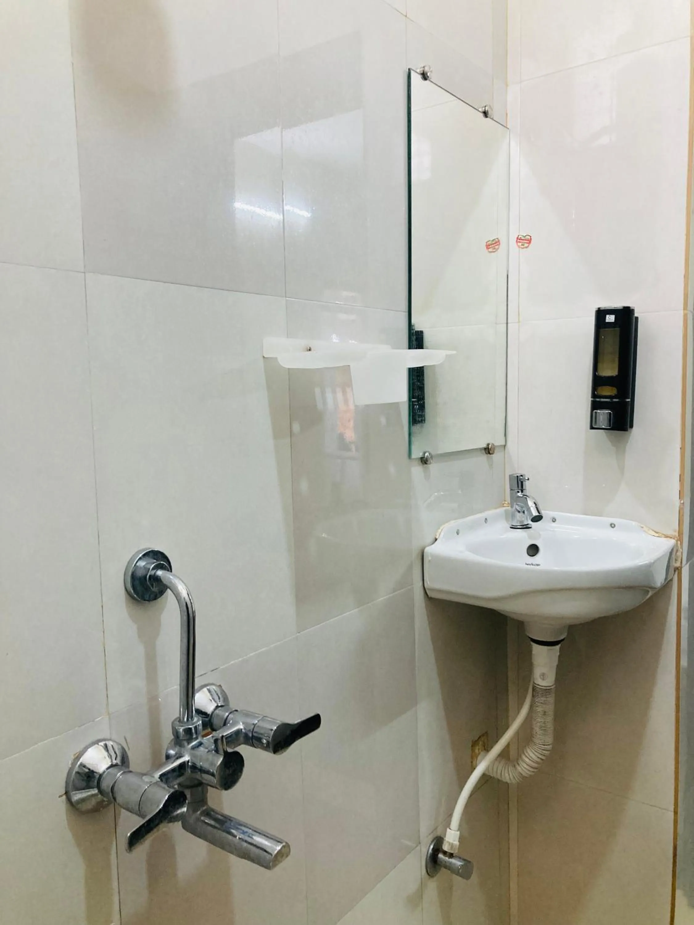 Bathroom in Oceanic Stay And Restaurant Gokarna