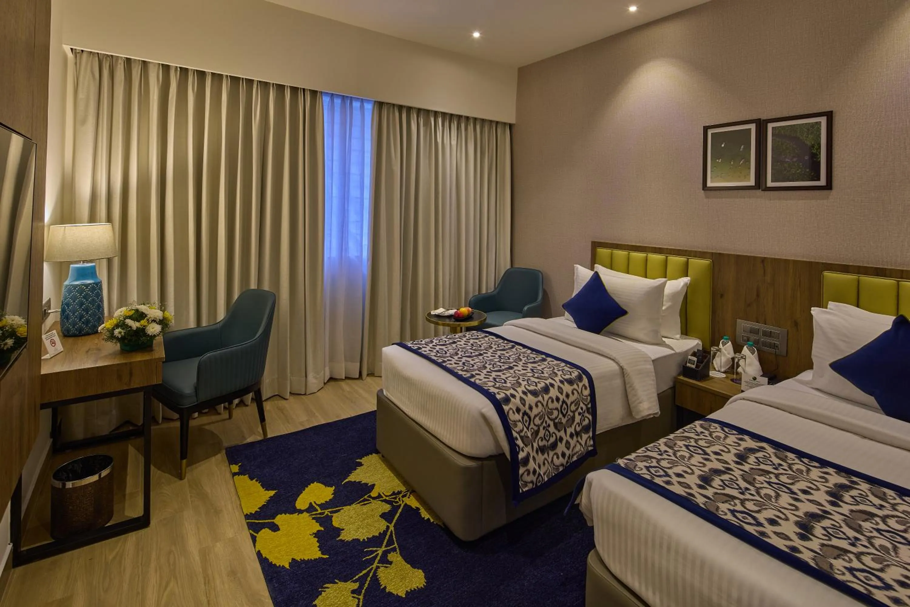 Bedroom, Bed in Grand Continent Hebbal A Sarovar Portico Affiliate Hotel