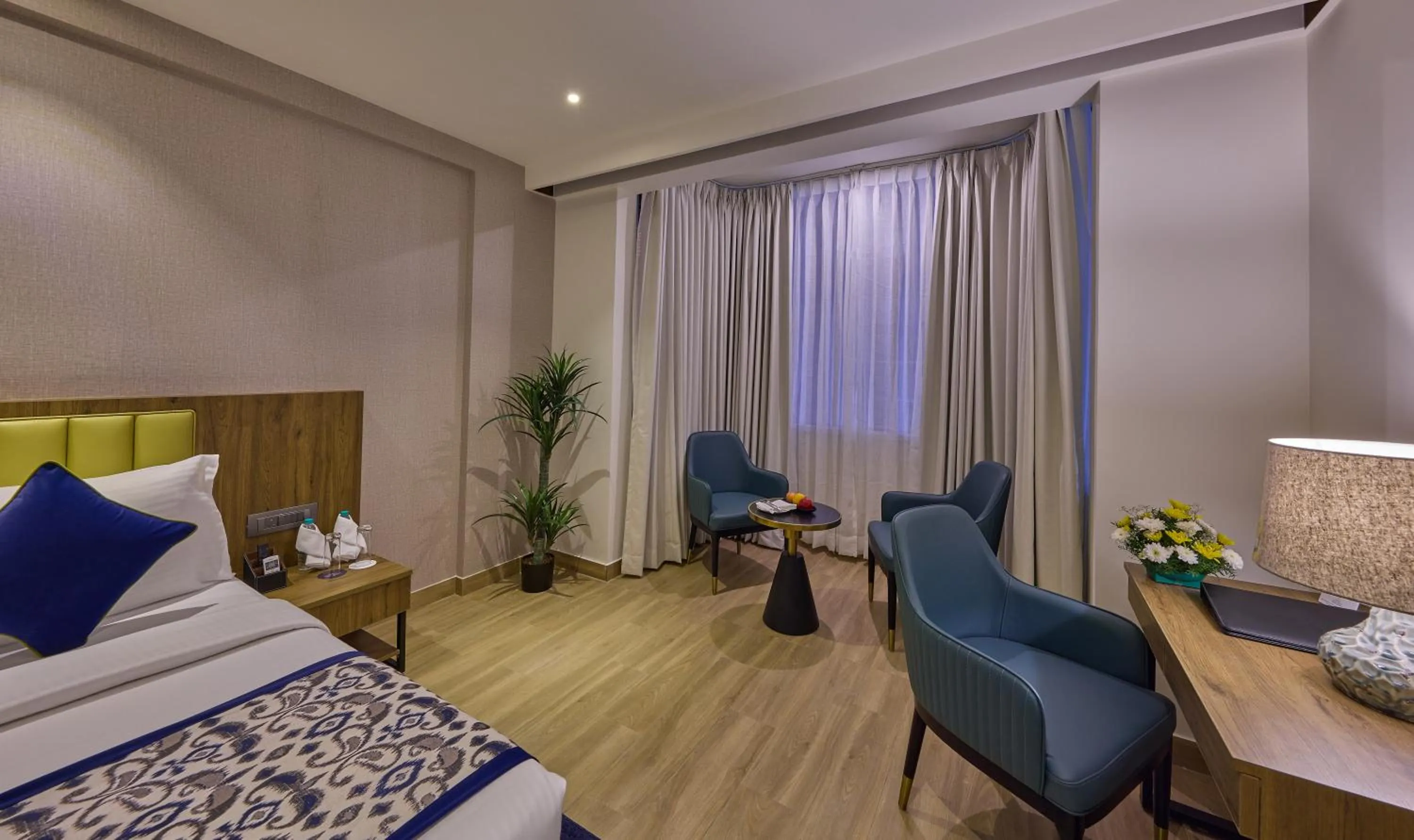 Bedroom, Bed in Grand Continent Hebbal A Sarovar Portico Affiliate Hotel