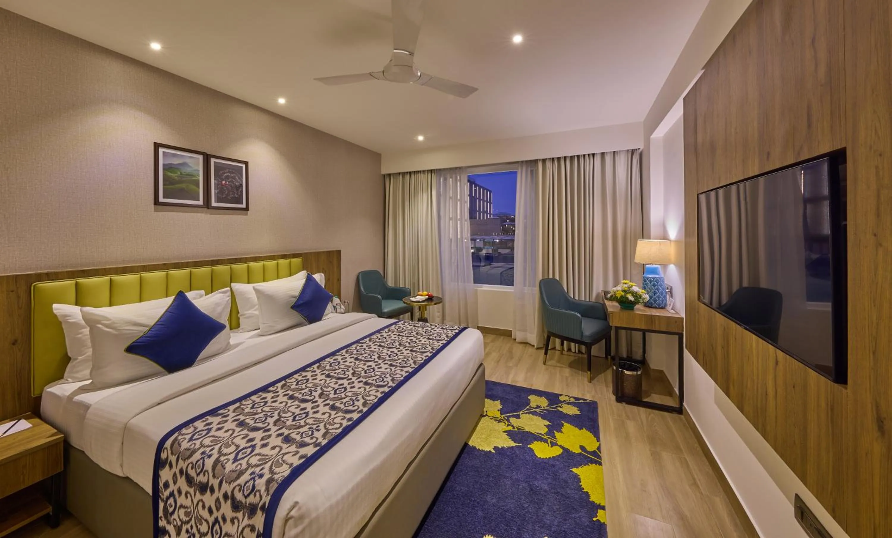 Bedroom, Bed in Grand Continent Hebbal A Sarovar Portico Affiliate Hotel