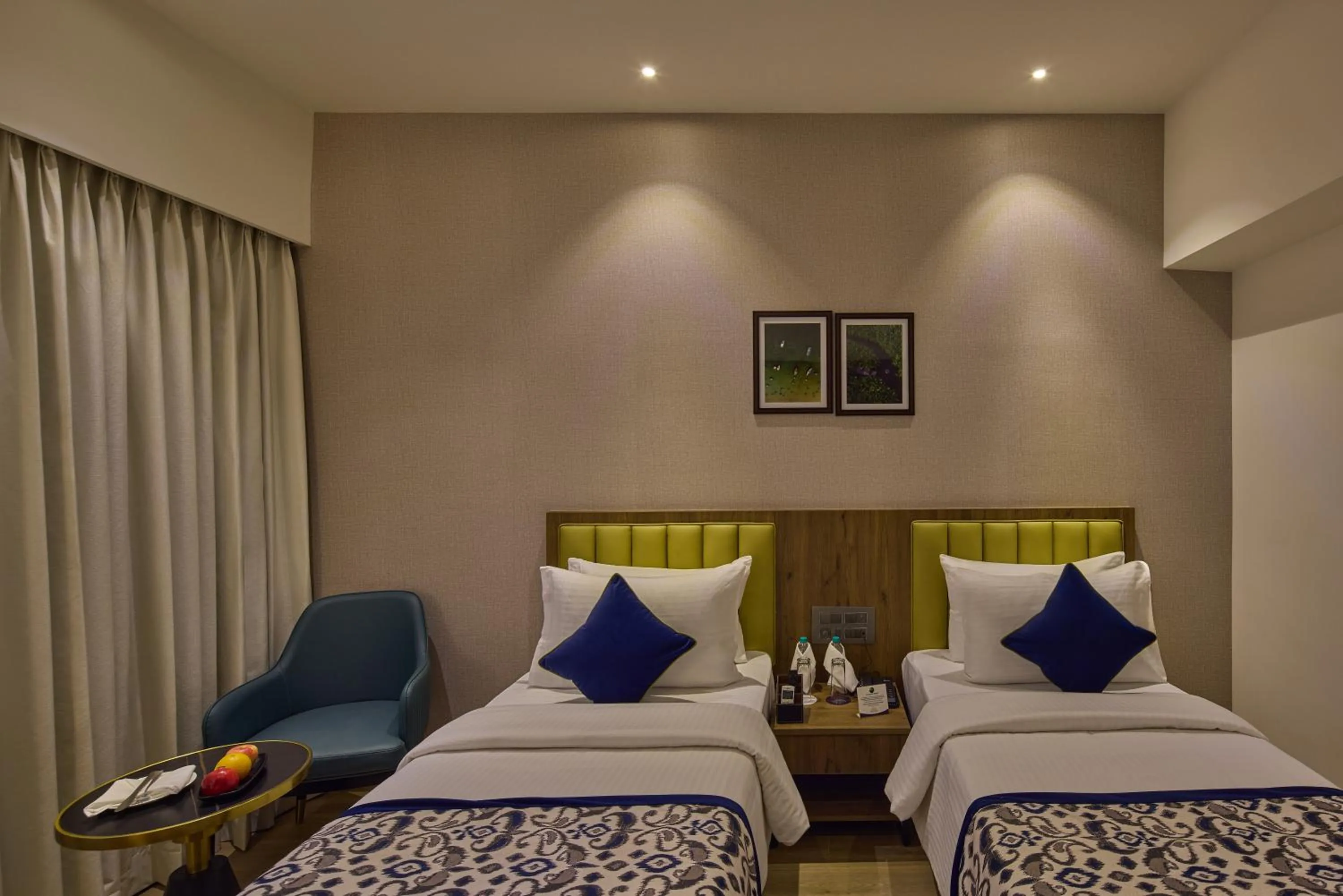 Bed in Grand Continent Hebbal A Sarovar Portico Affiliate Hotel