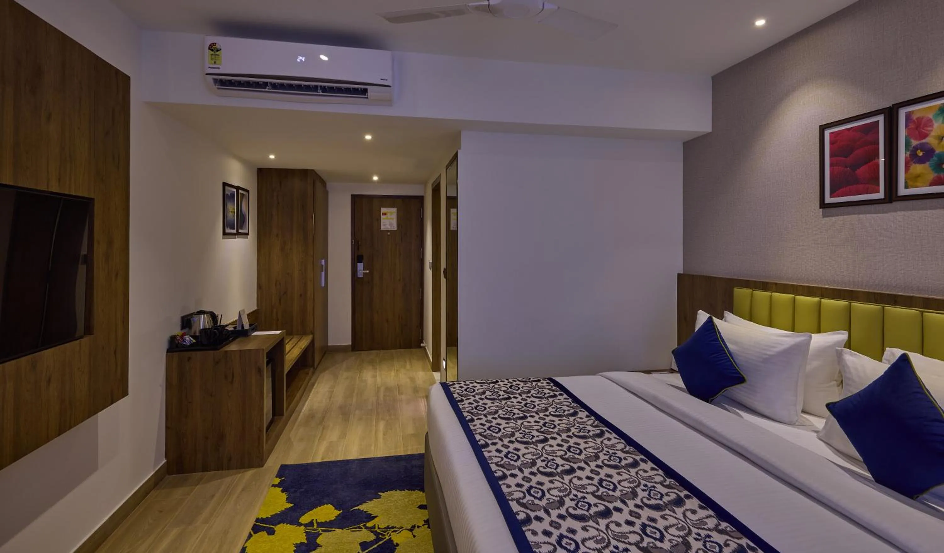 Bedroom, Bed in Grand Continent Hebbal A Sarovar Portico Affiliate Hotel