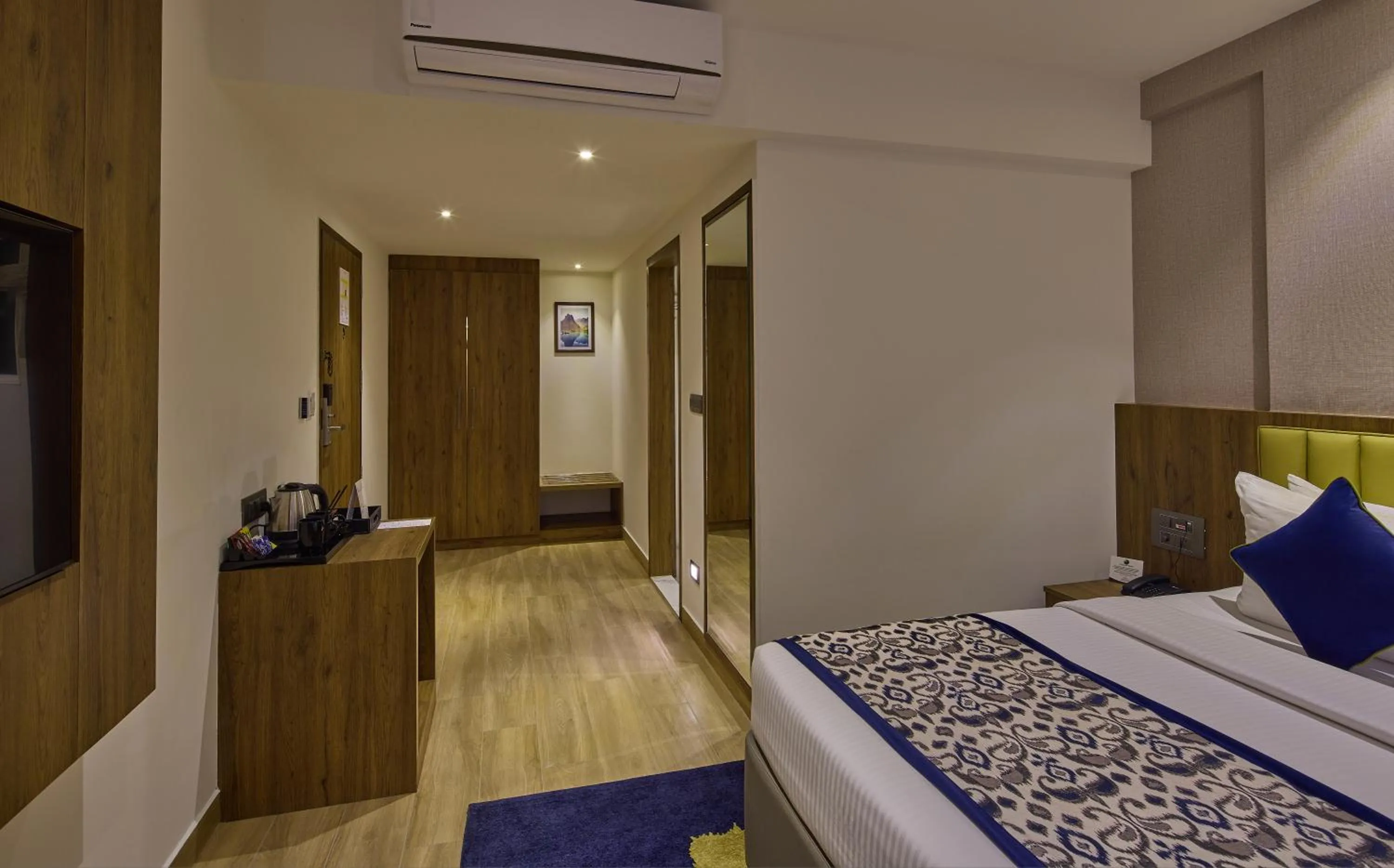 Bedroom, Bed in Grand Continent Hebbal A Sarovar Portico Affiliate Hotel