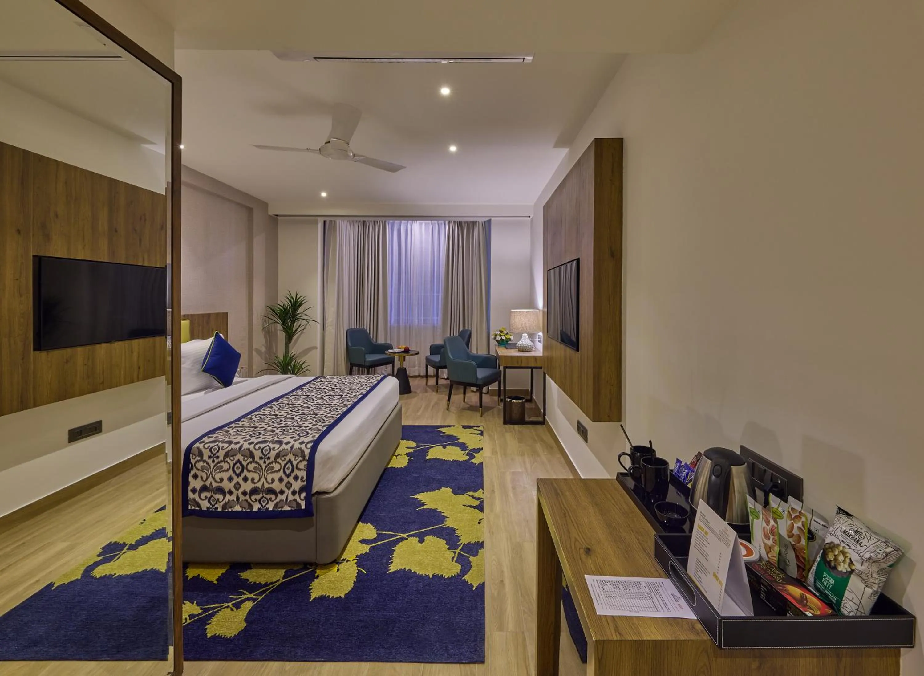 Bedroom, Bed in Grand Continent Hebbal A Sarovar Portico Affiliate Hotel