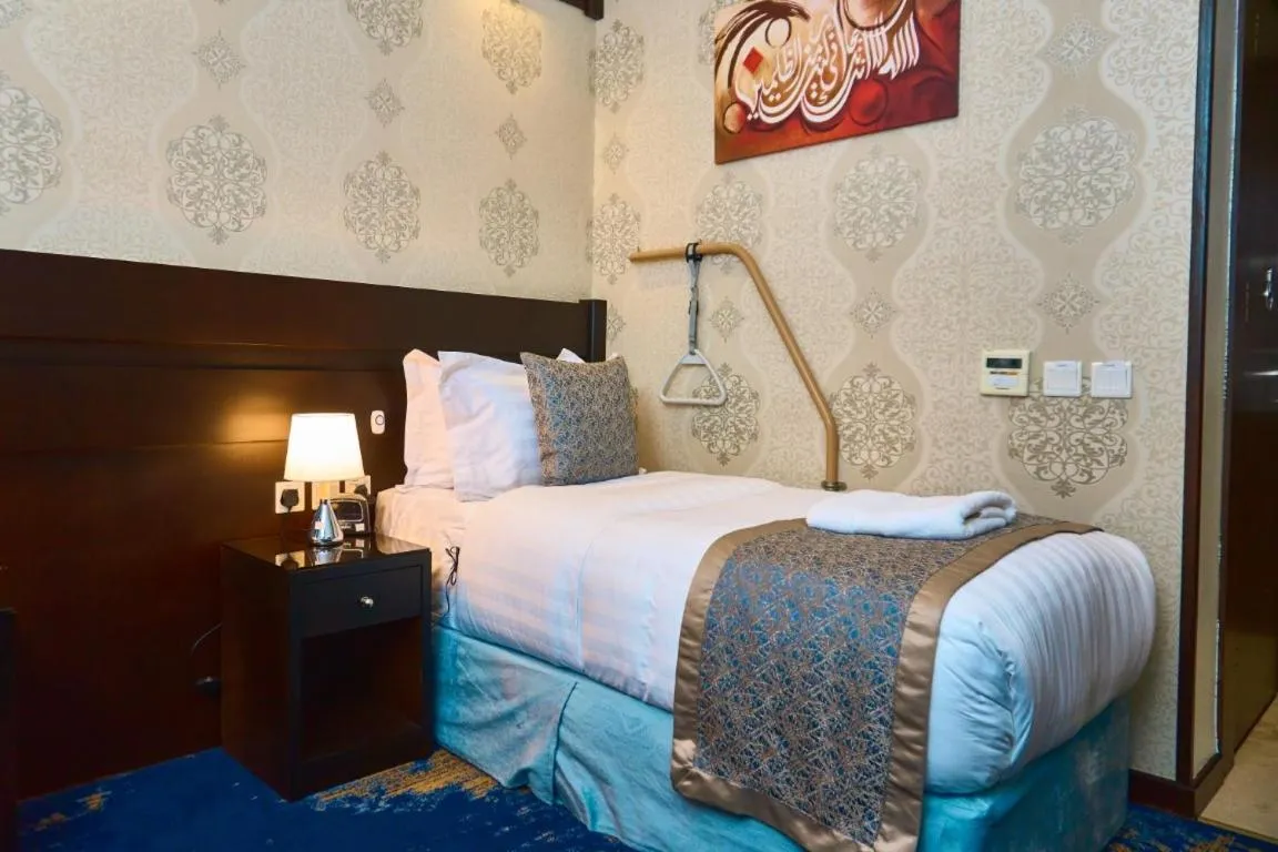 Photo of the whole room, Bed in Selat Al Bait Hotel