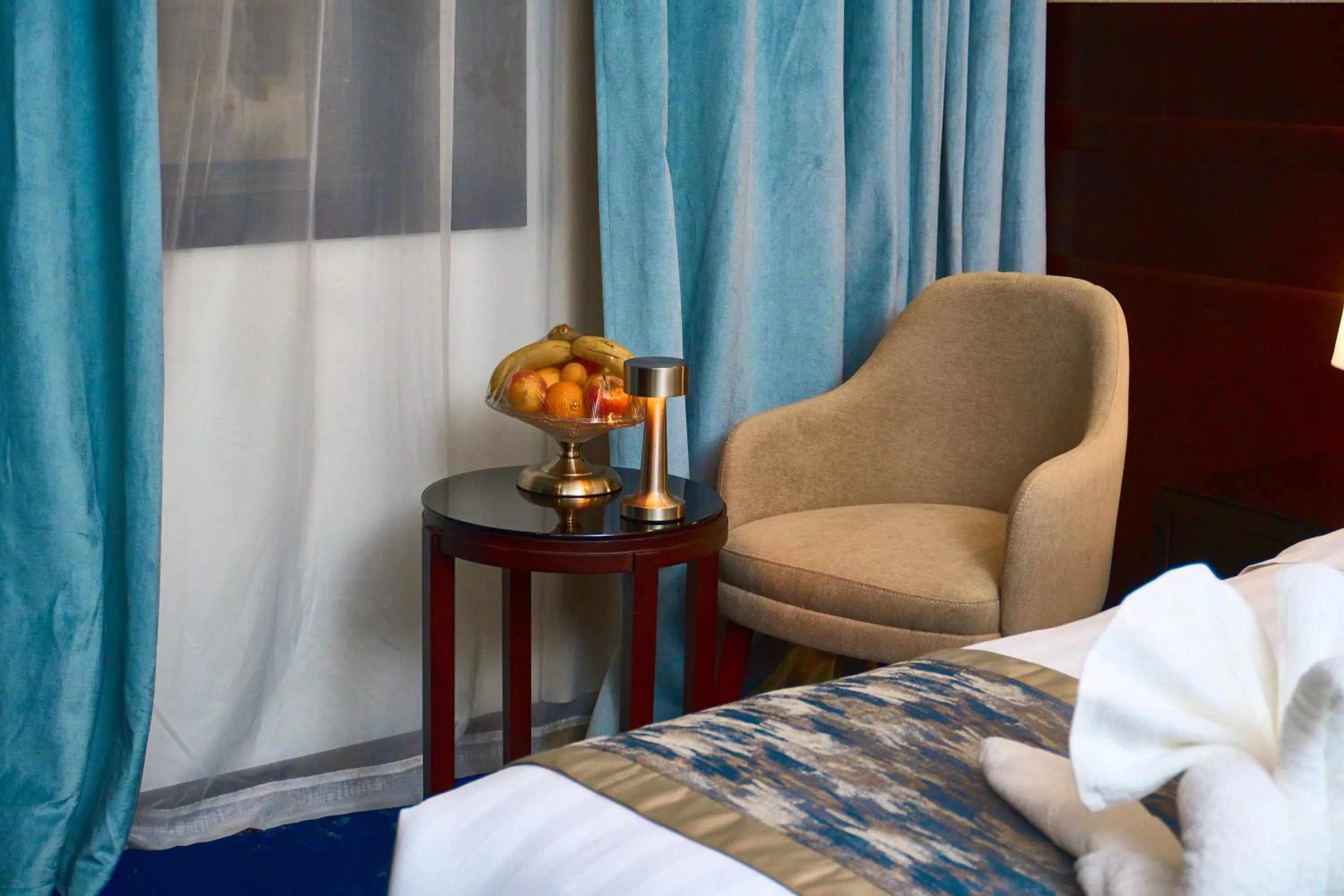 Seating area, Bed in Selat Al Bait Hotel