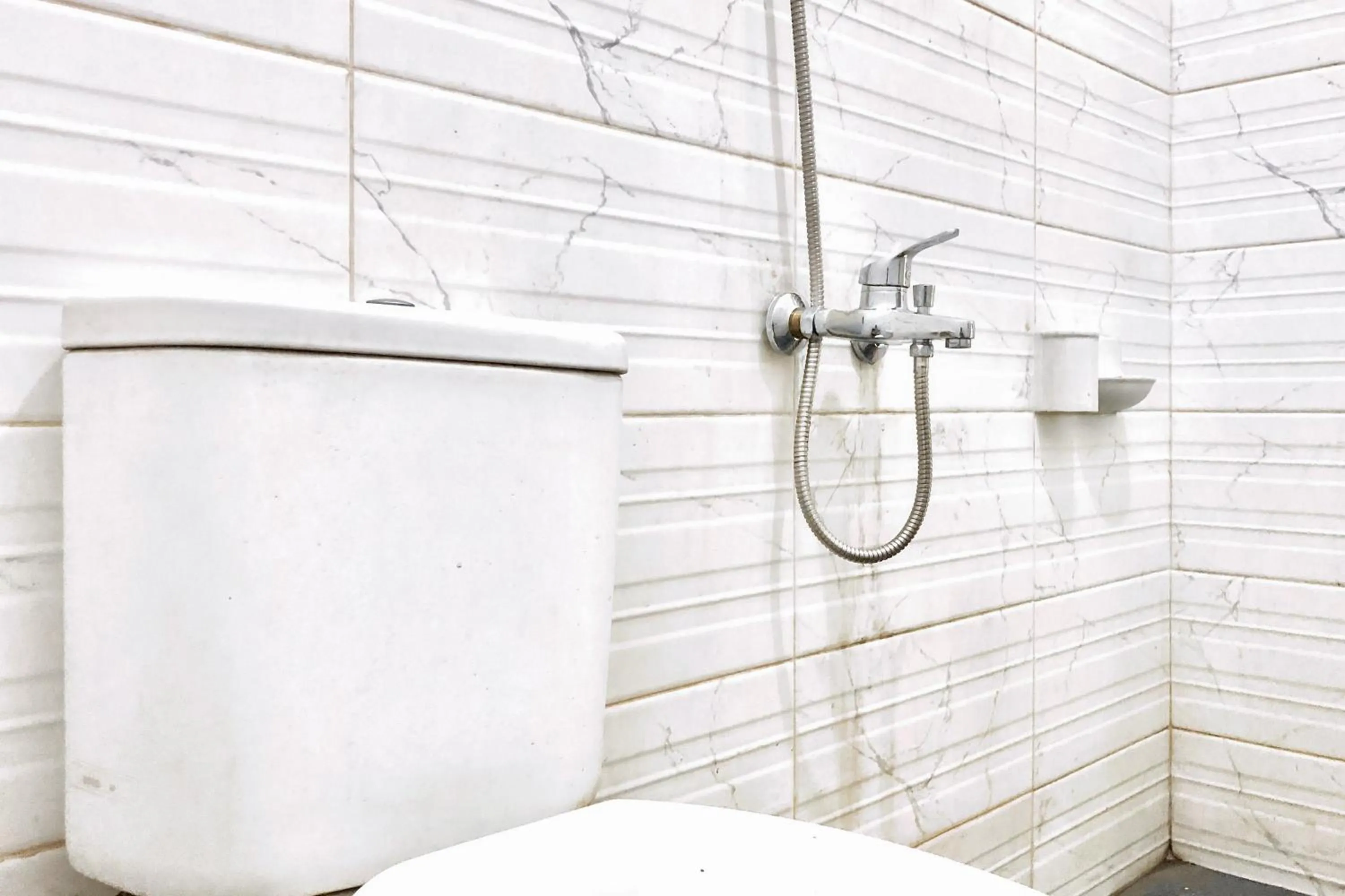 Bathroom in Hotel Mulia Tiza Binjai RedPartner