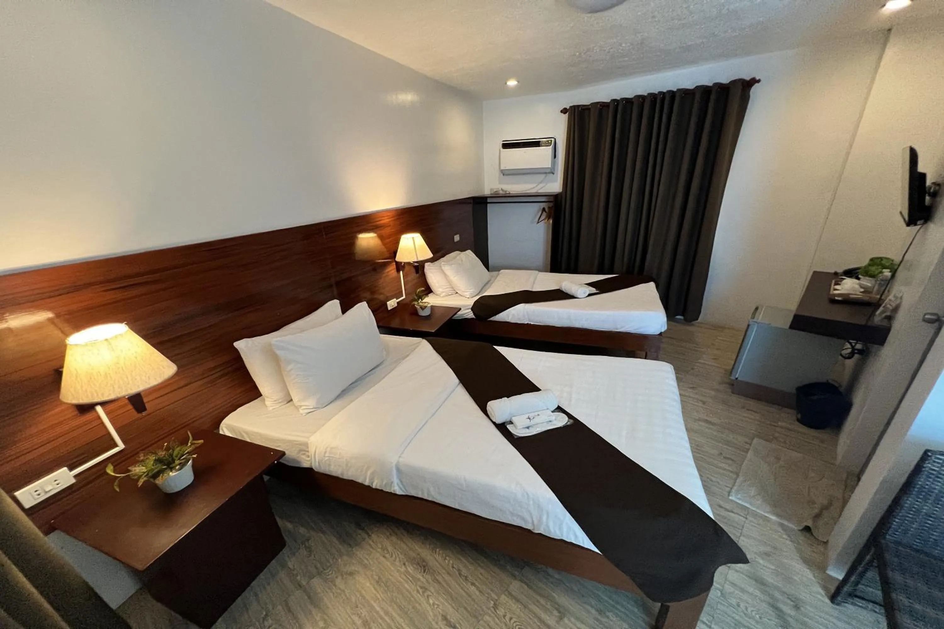 Bed in Funtasea Hotel and Beach Resort