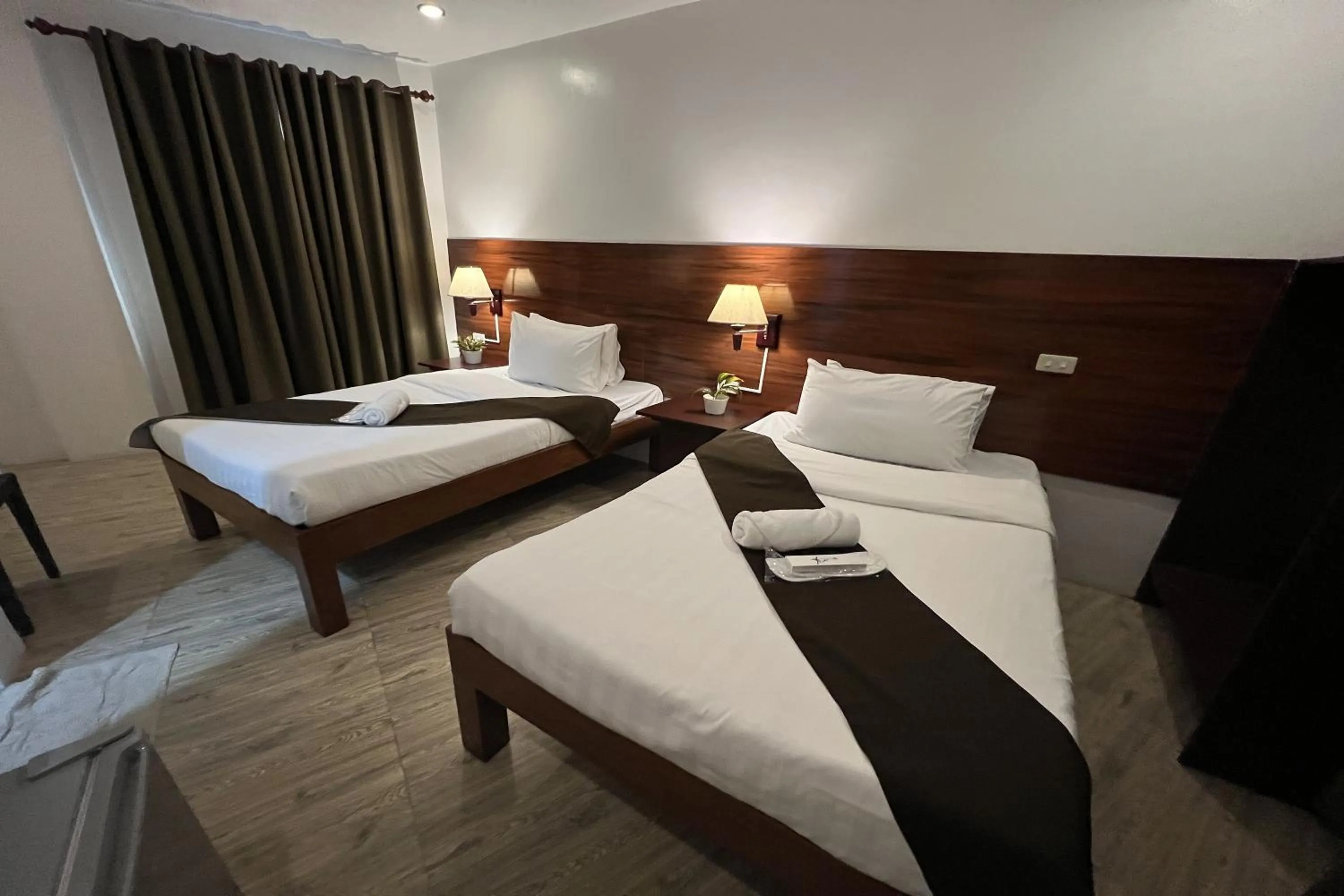 Bed in Funtasea Hotel and Beach Resort