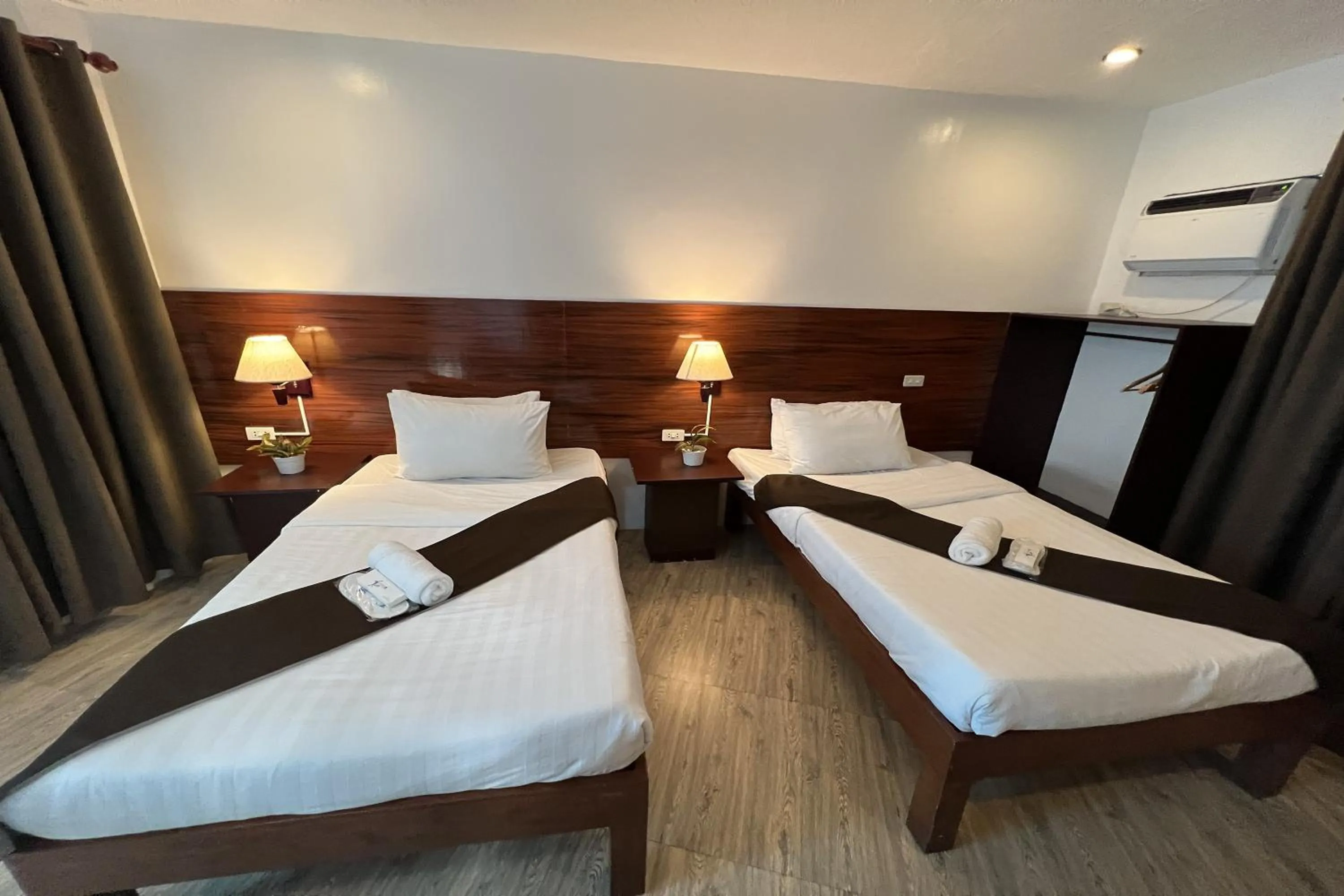 Bed in Funtasea Hotel and Beach Resort