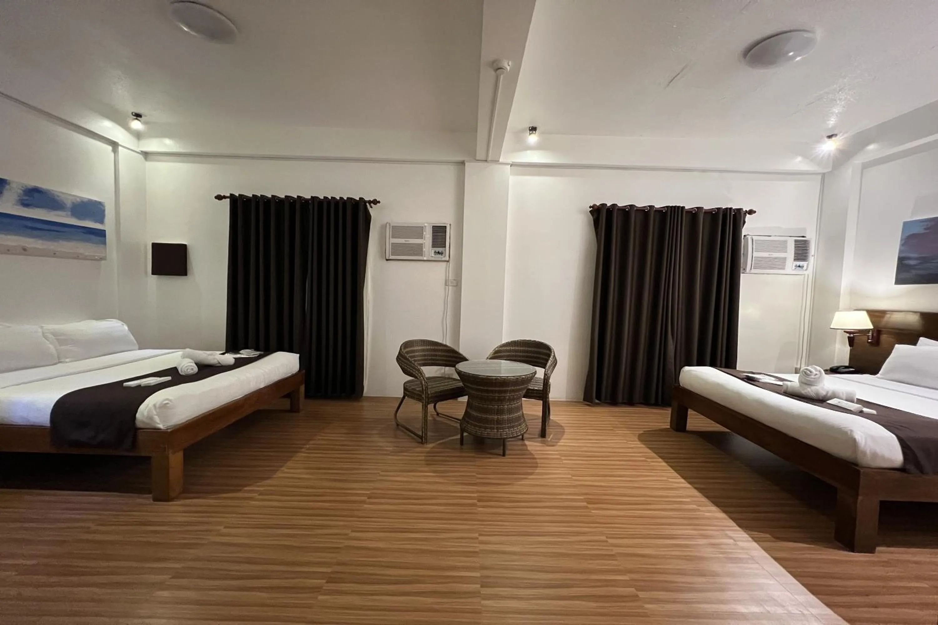 Bed in Funtasea Hotel and Beach Resort