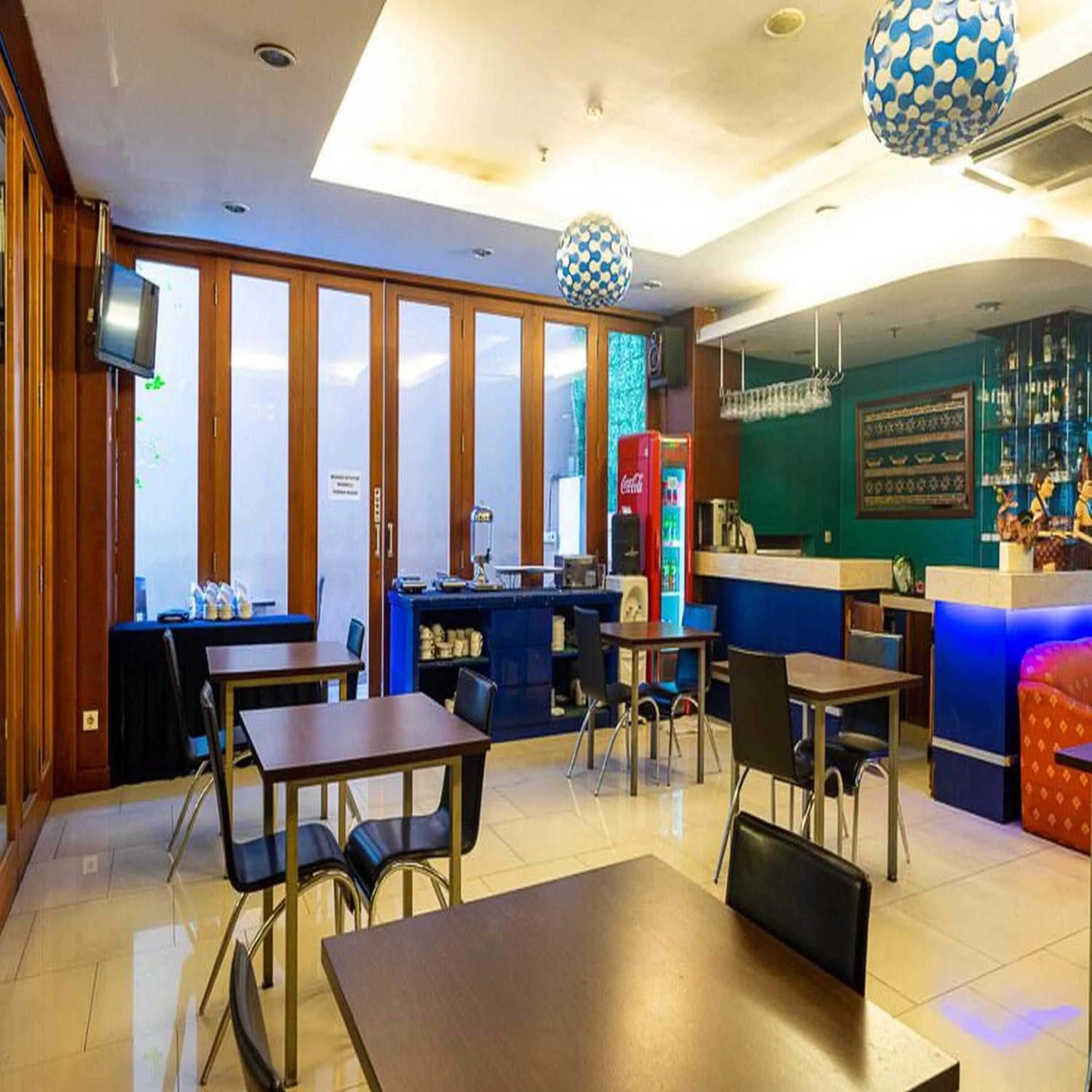 Seating area in RedDoorz Plus at Blue Pacific Blok M