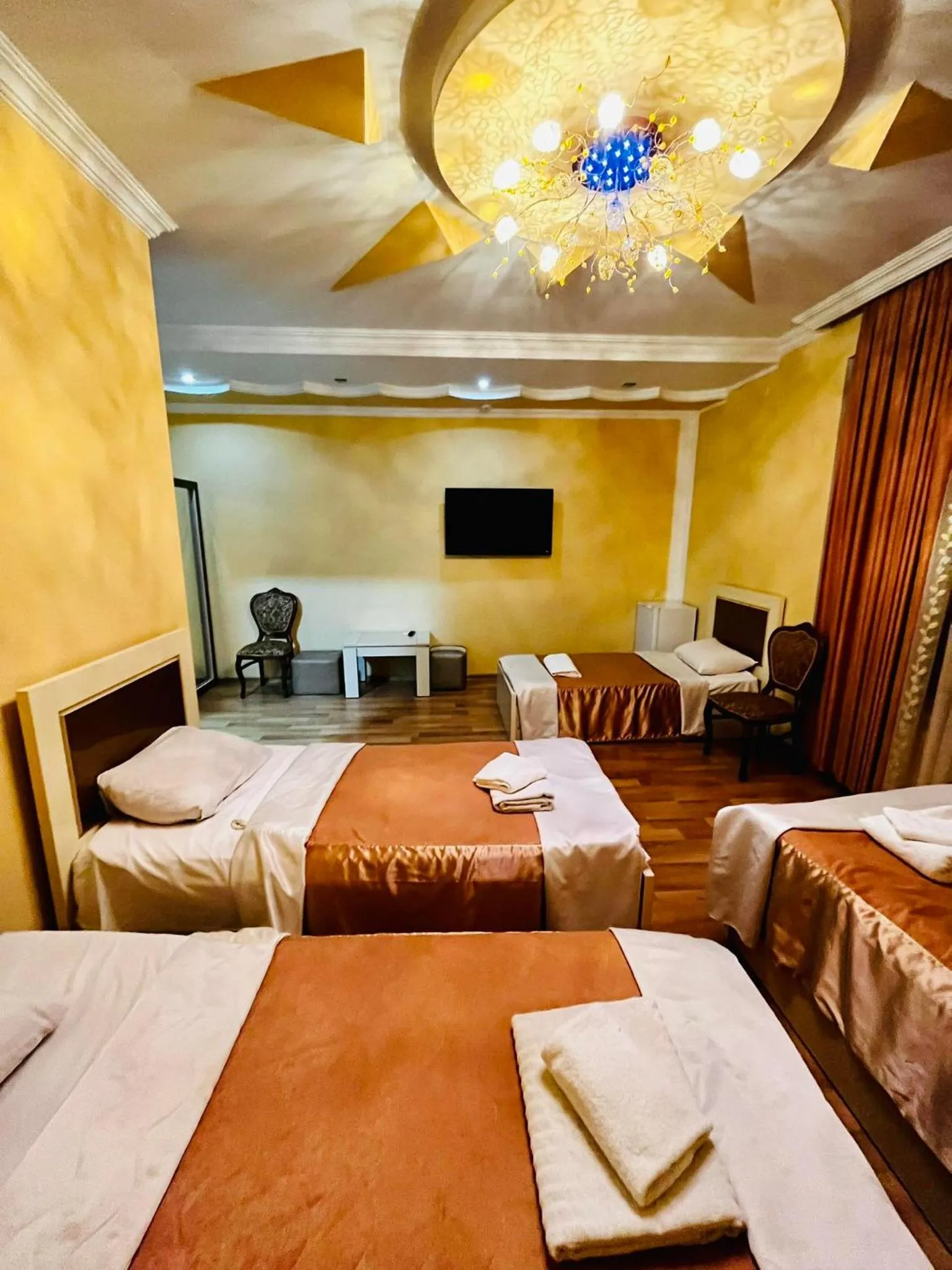 Bed in Lux Palace Hotel