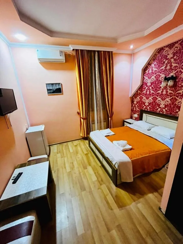 Bed in Lux Palace Hotel