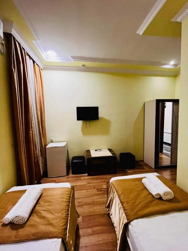 Bed in Lux Palace Hotel