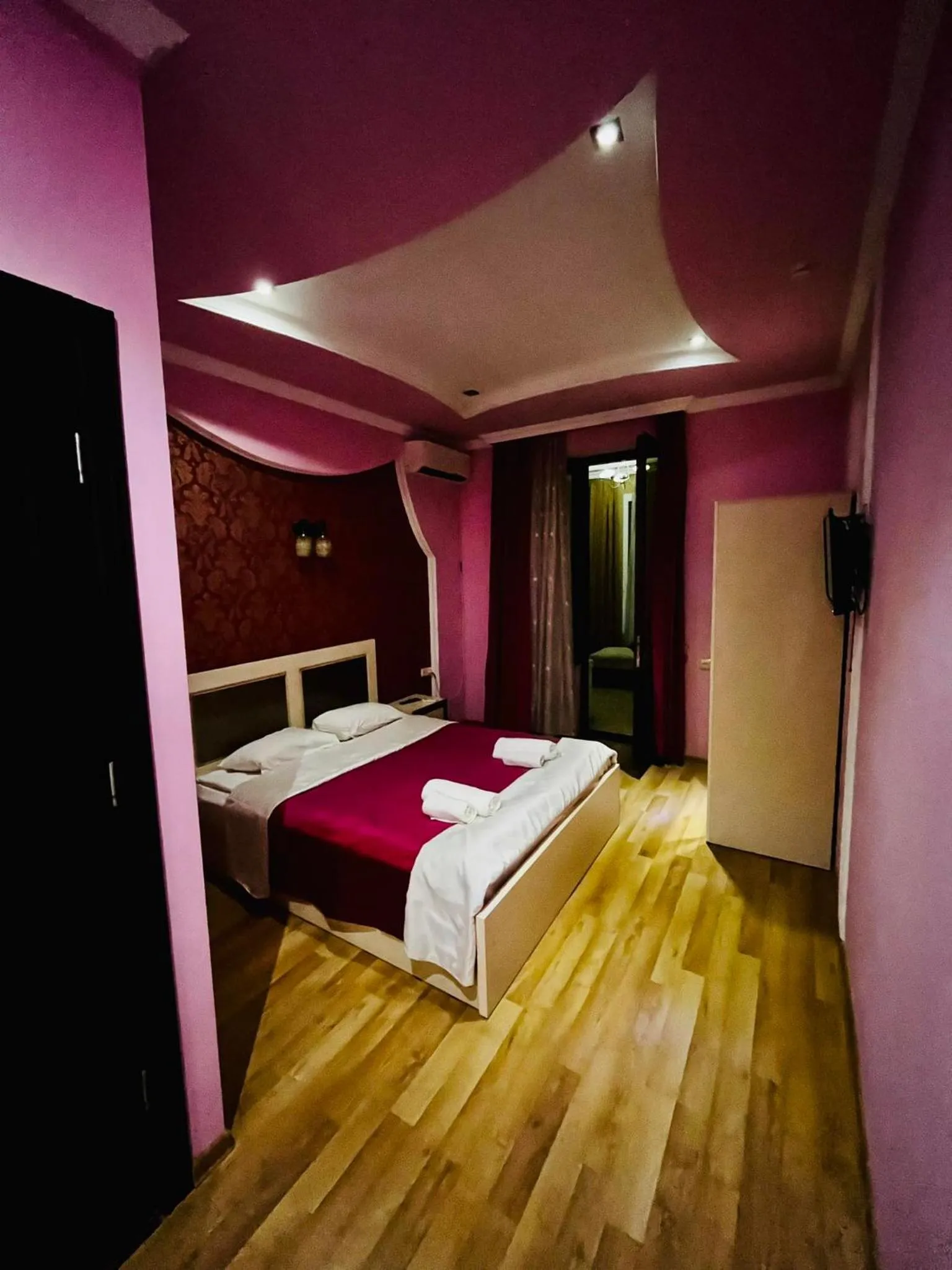 Bed in Lux Palace Hotel