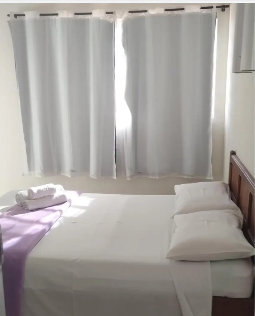 Bed in Pousada Rubbi Violeta