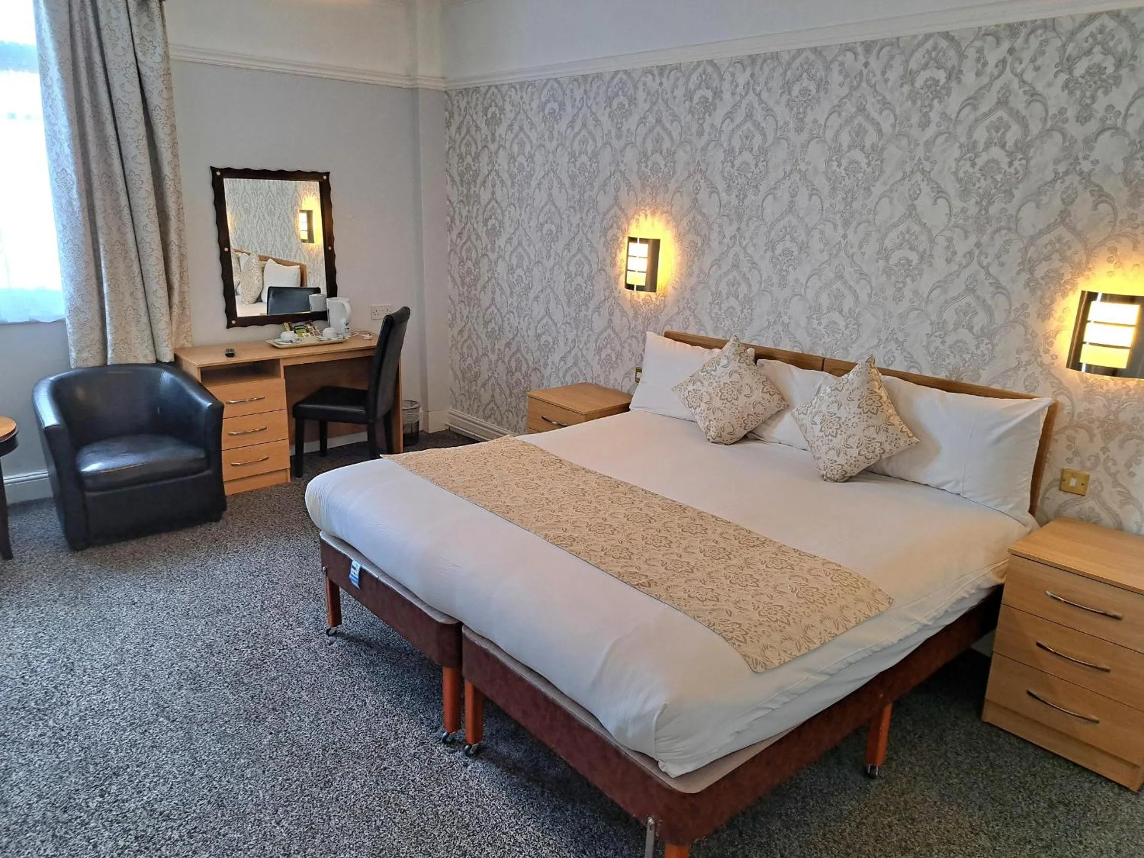 Bed in Prince Of Wales Hotel