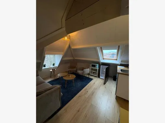 Seating area, Bed in Hotel Veere