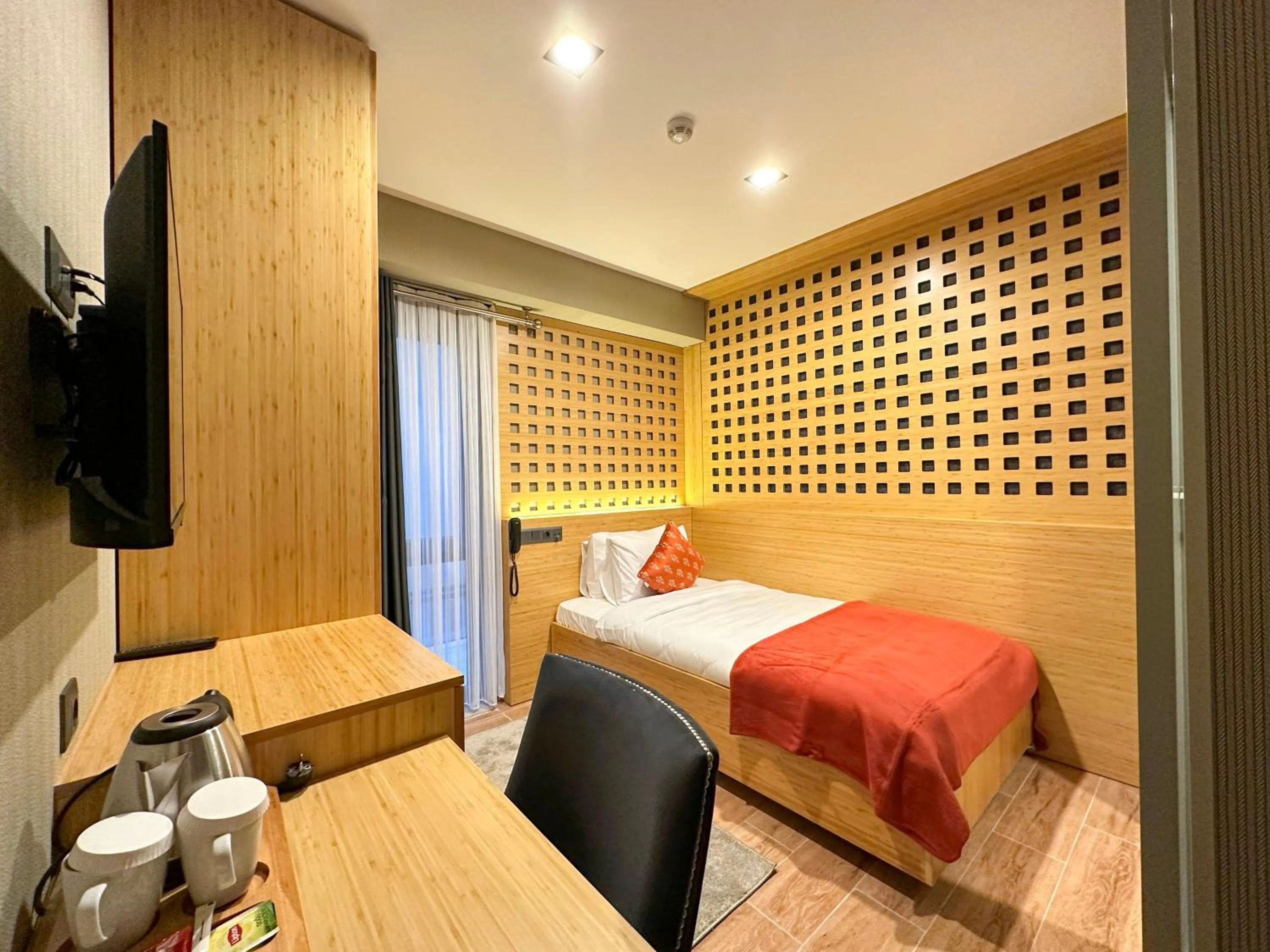 Decorative detail, Bed in Mihman Hotel