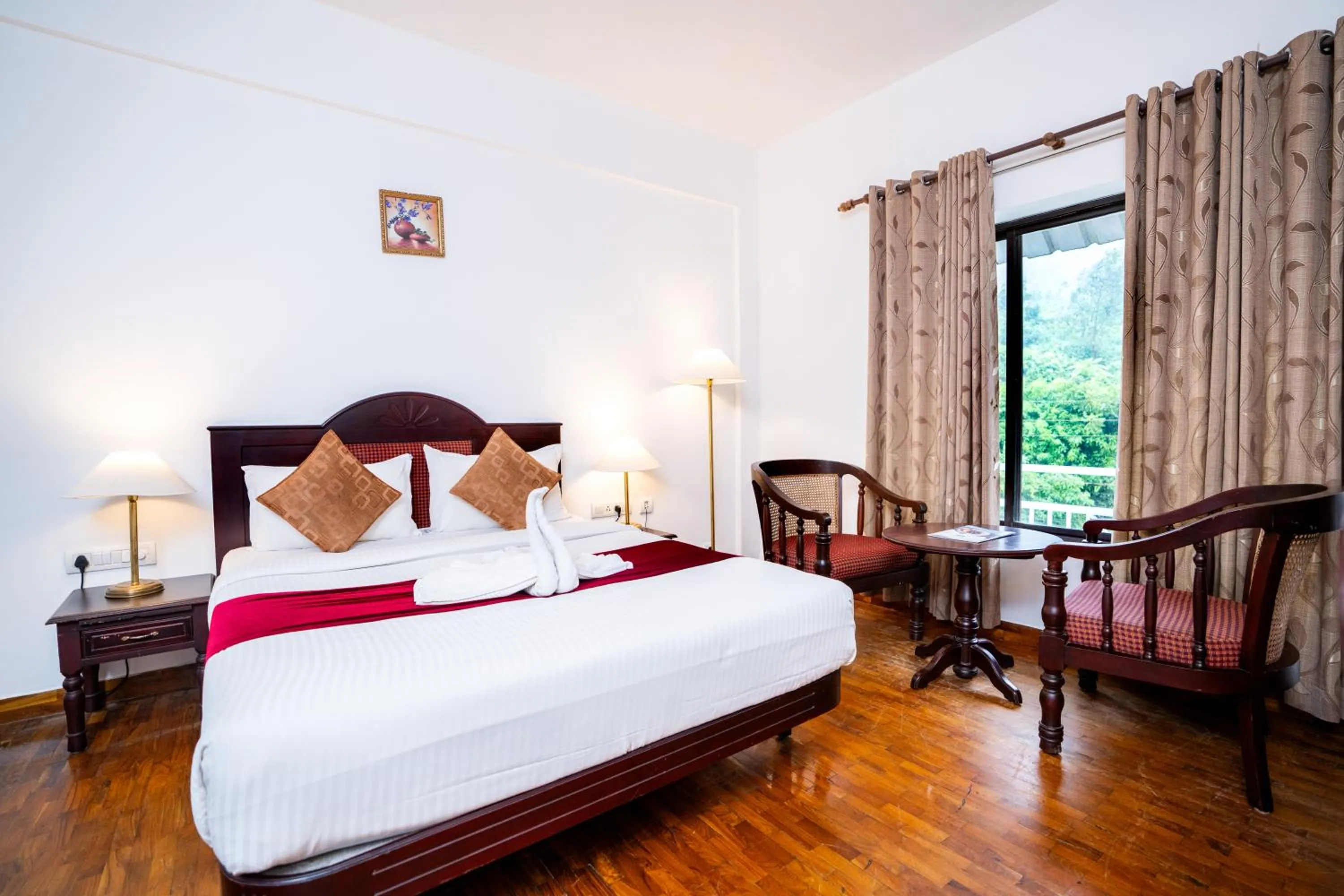 Seating area, Bed in Hotel C7 Munnar