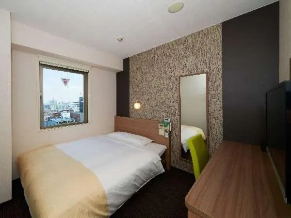 Bed in Super Hotel Shinjuku Kabukicho