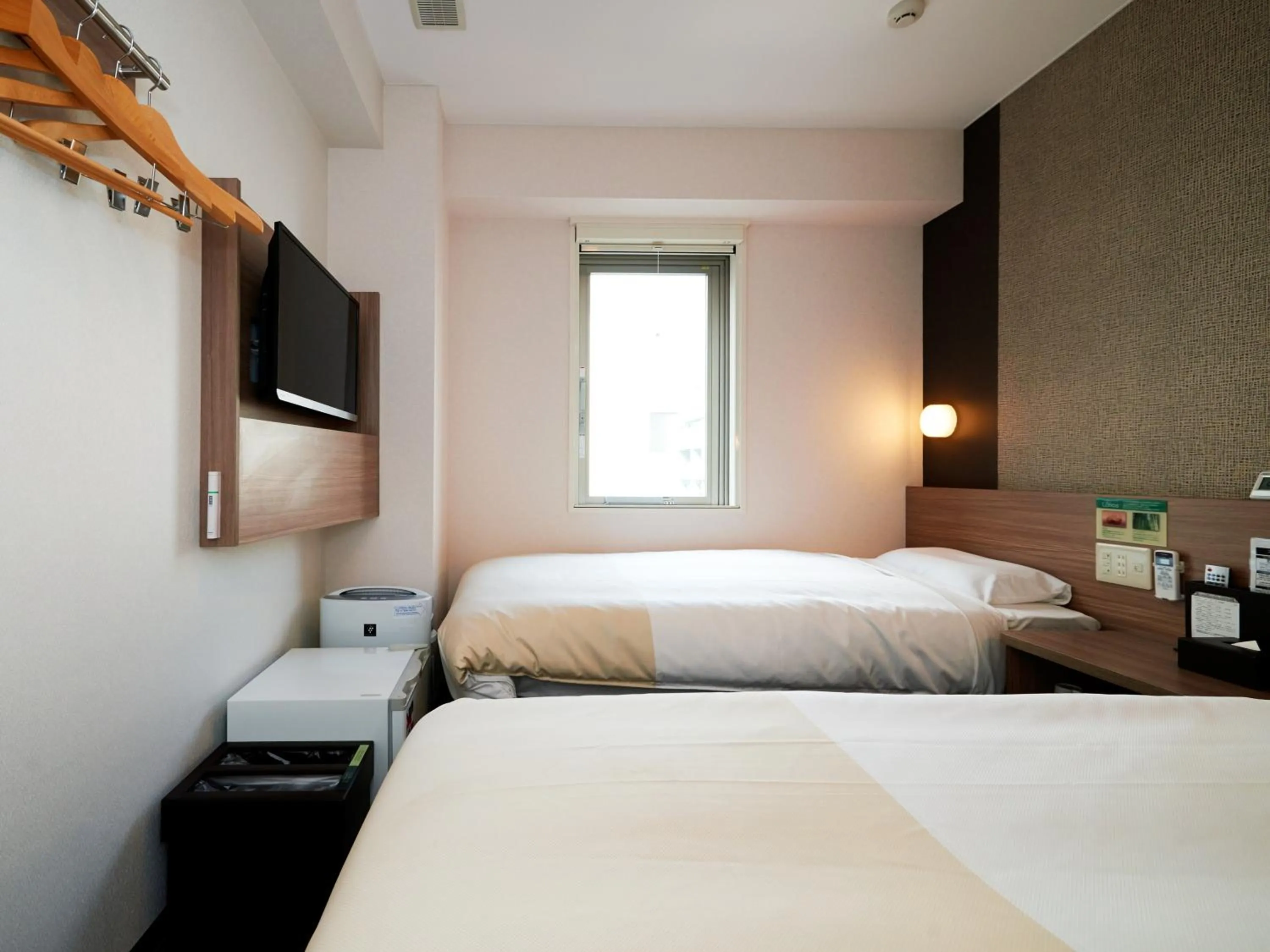 Bed in Super Hotel Shinjuku Kabukicho