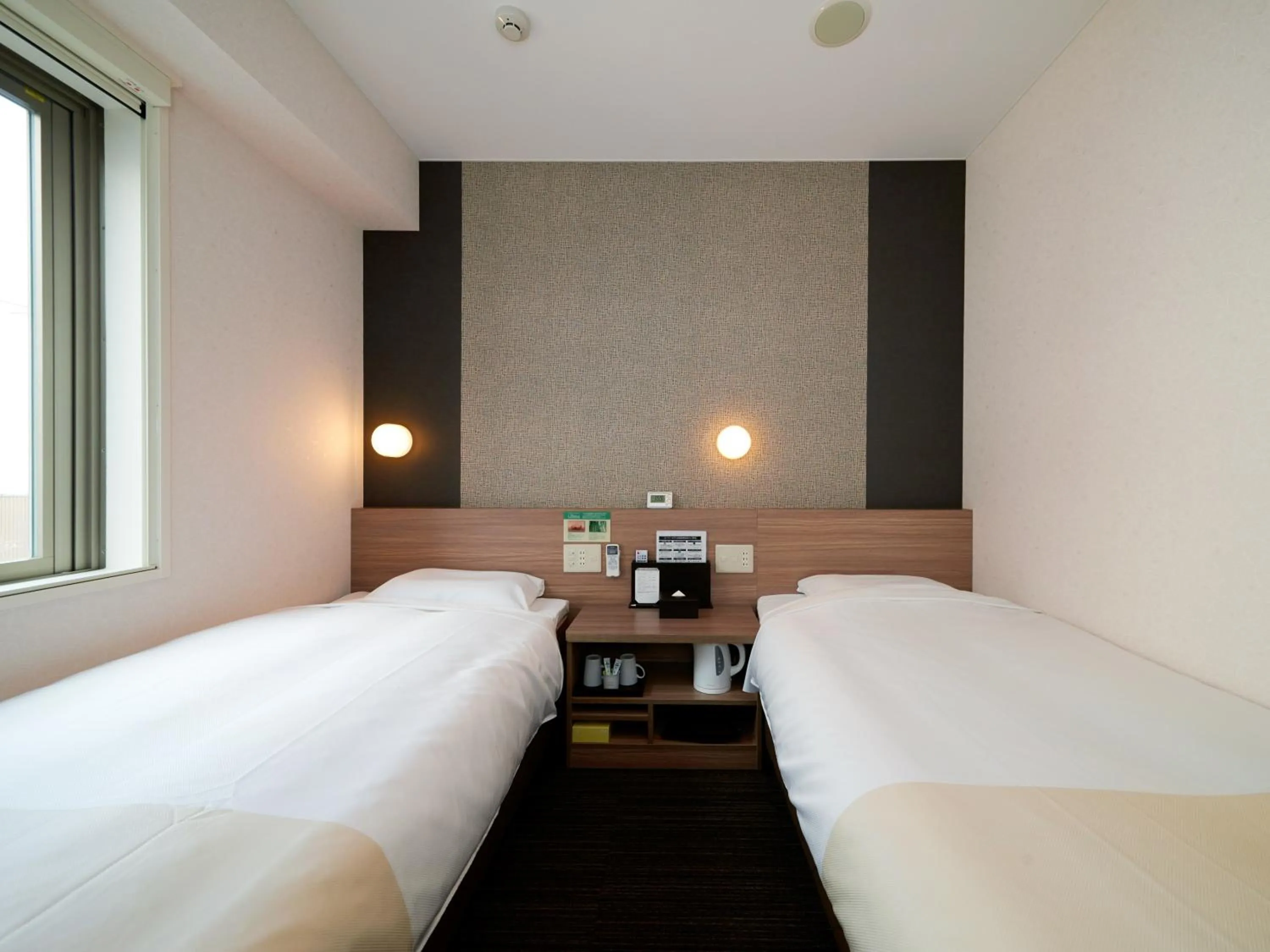 Bed in Super Hotel Shinjuku Kabukicho