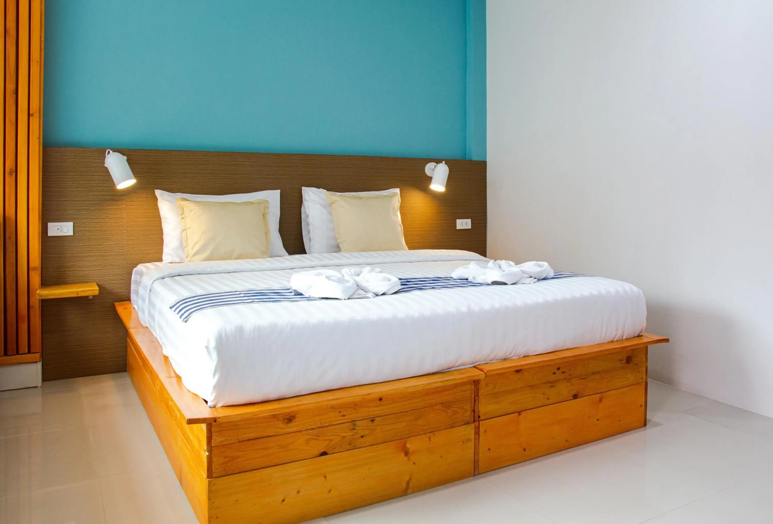 Bed in Kamala Beach Residence