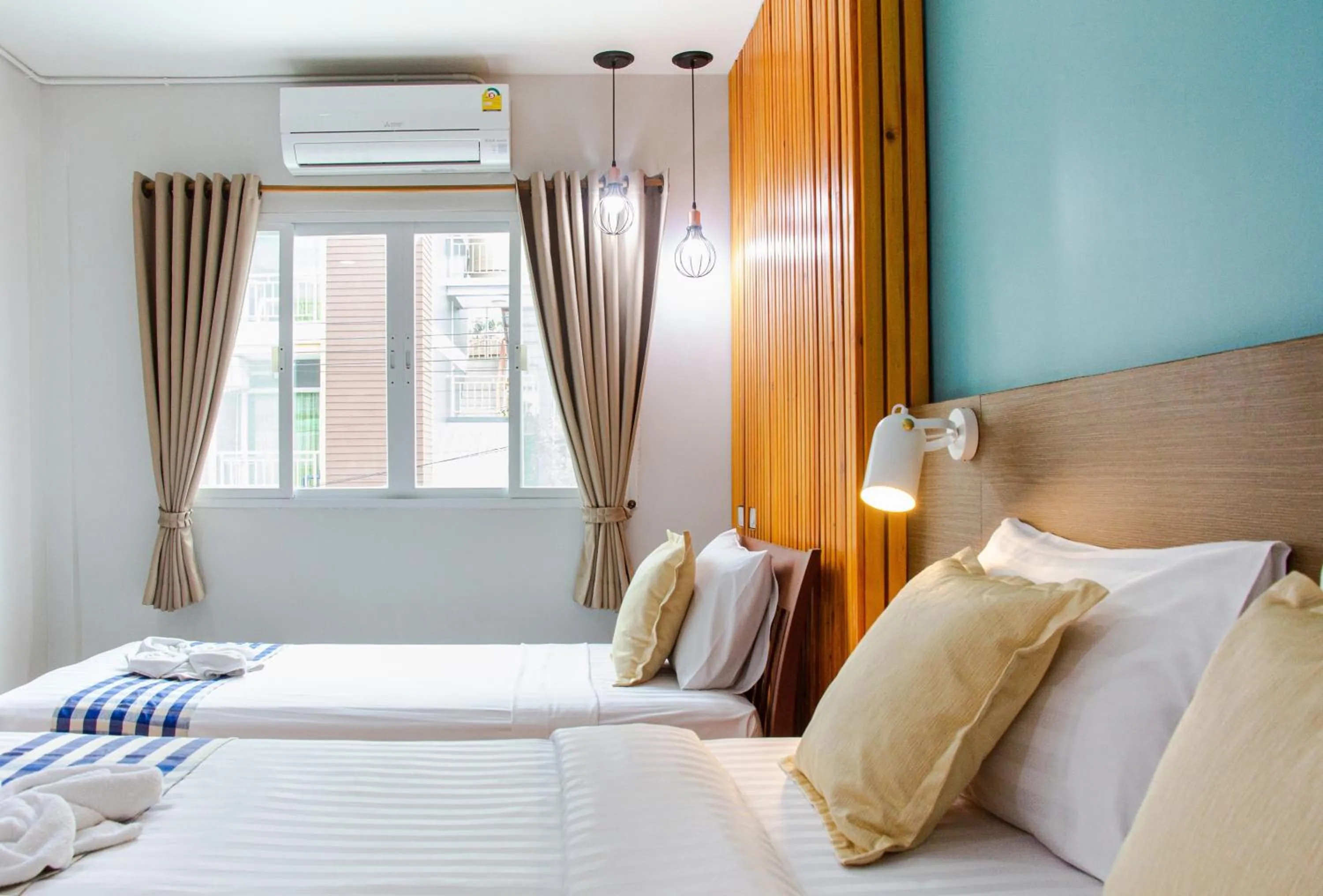 Bed in Kamala Beach Residence