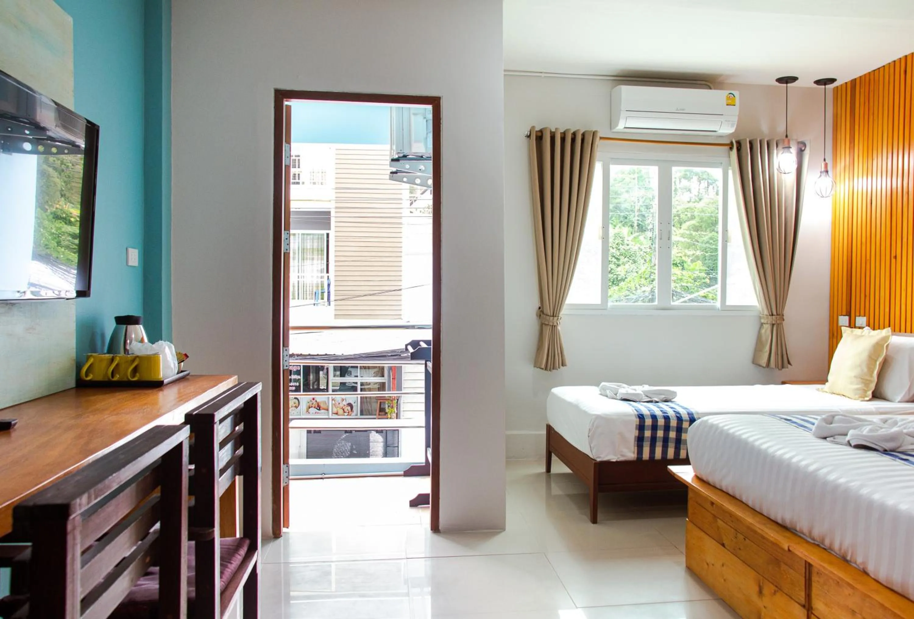 Bed in Kamala Beach Residence