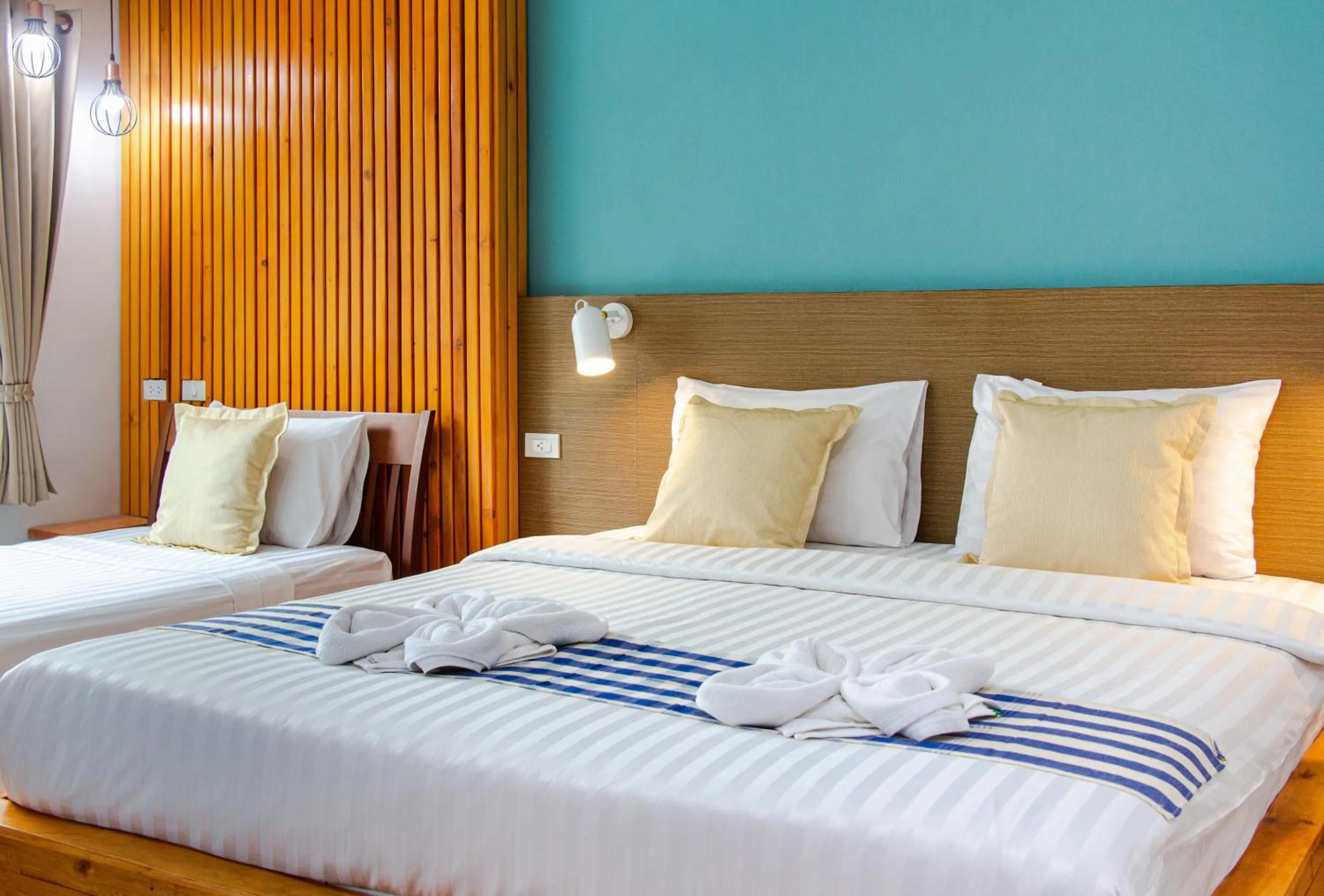 Bed in Kamala Beach Residence