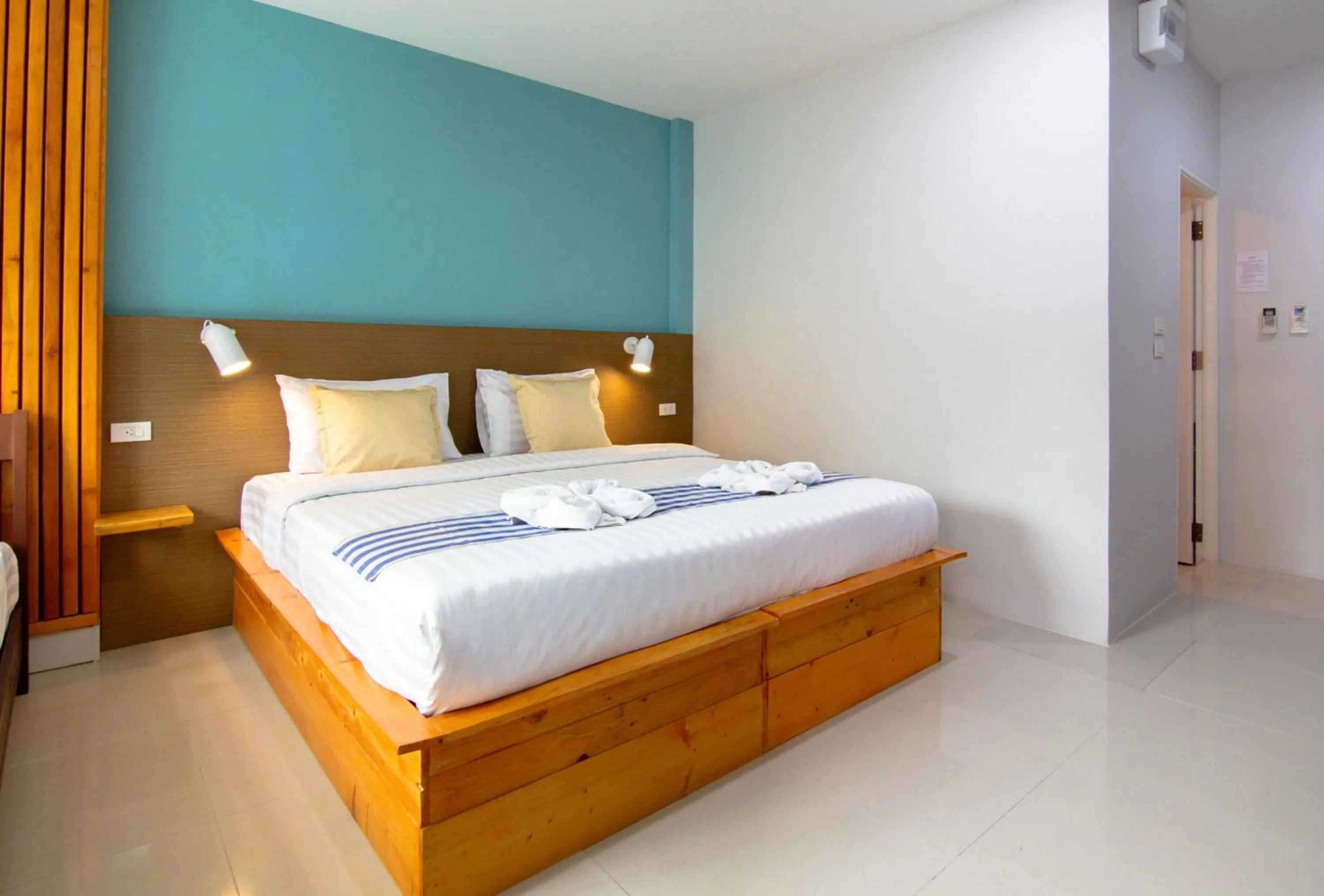 Bed in Kamala Beach Residence