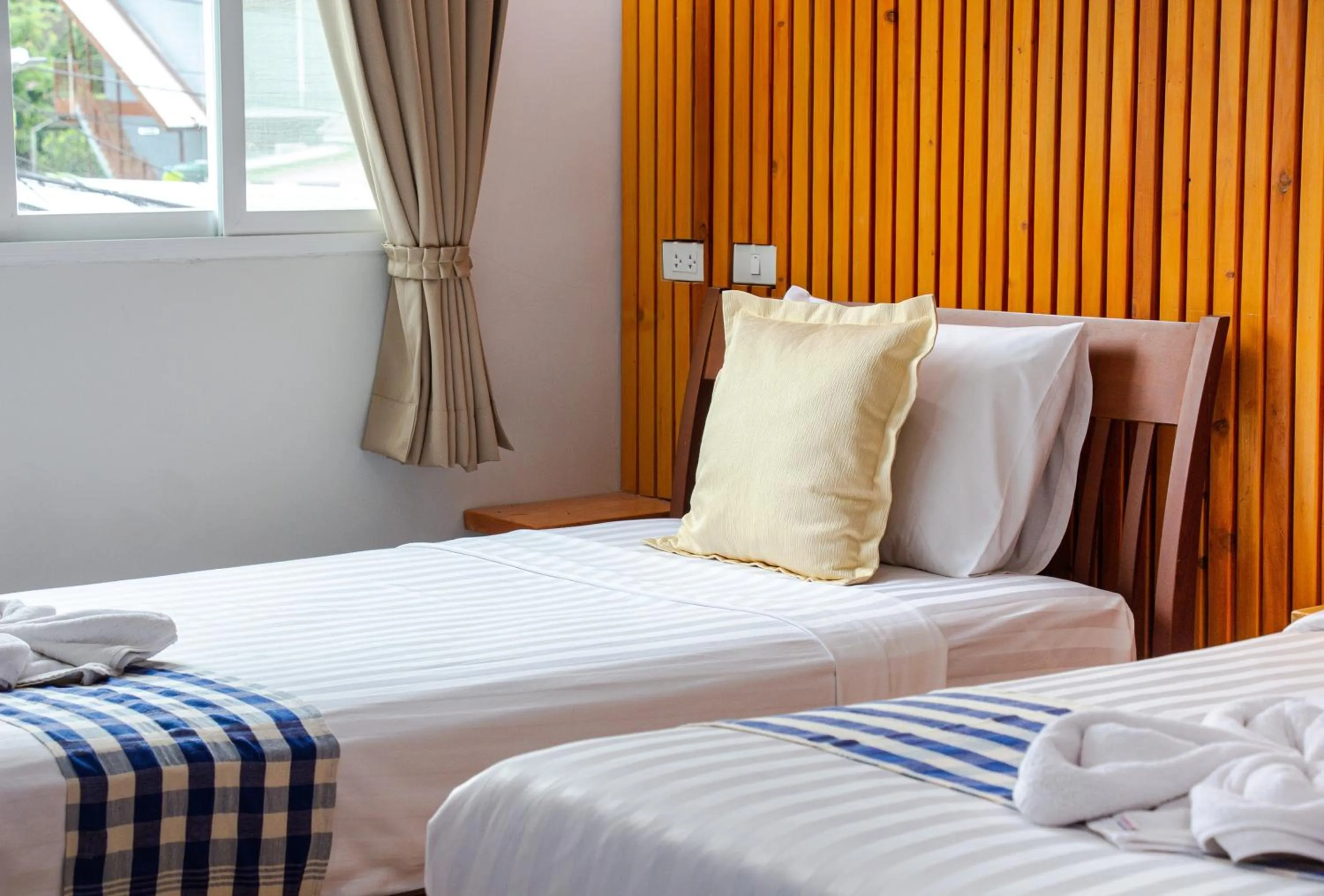 Bed in Kamala Beach Residence