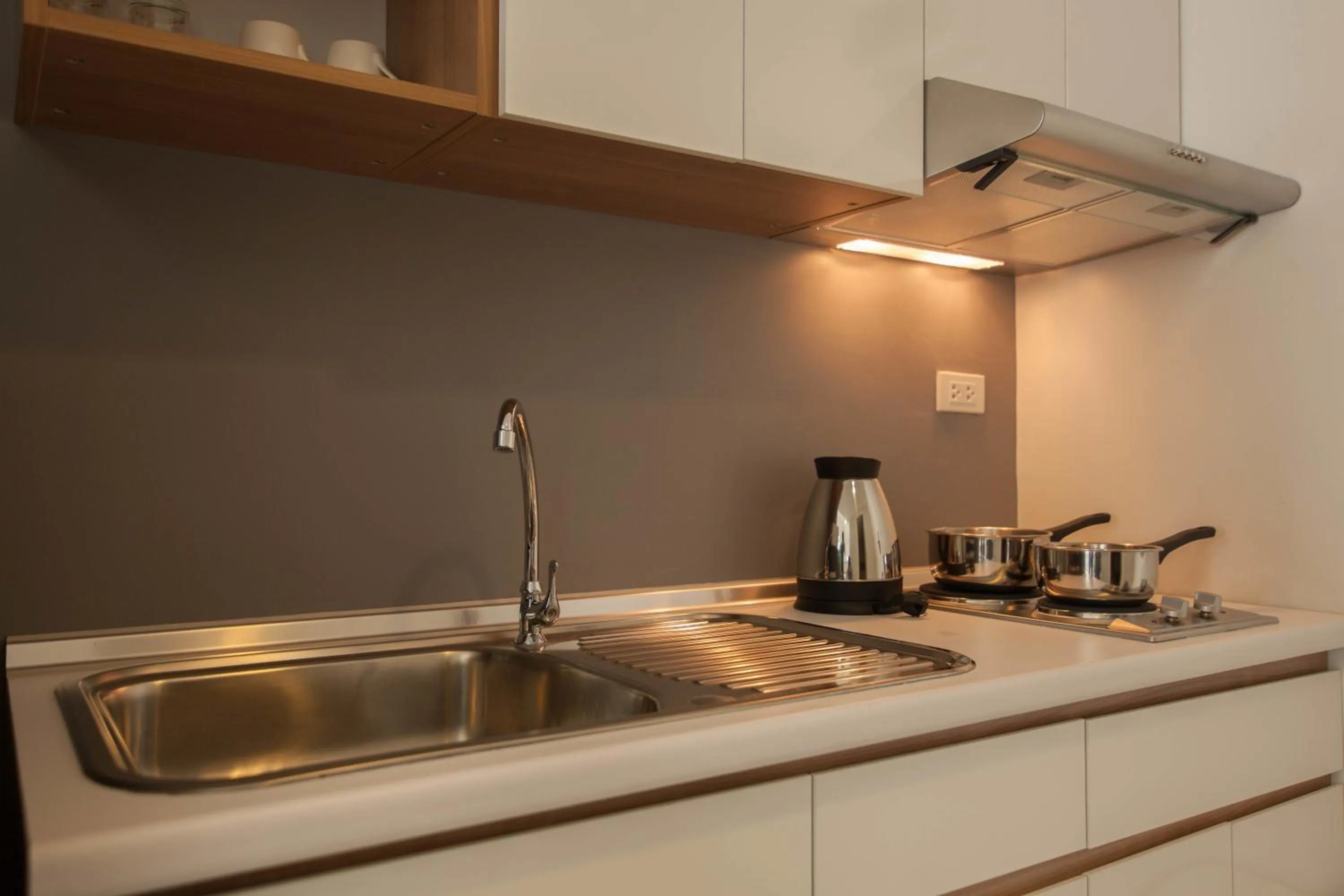 Kitchen or kitchenette in Racha Residence
