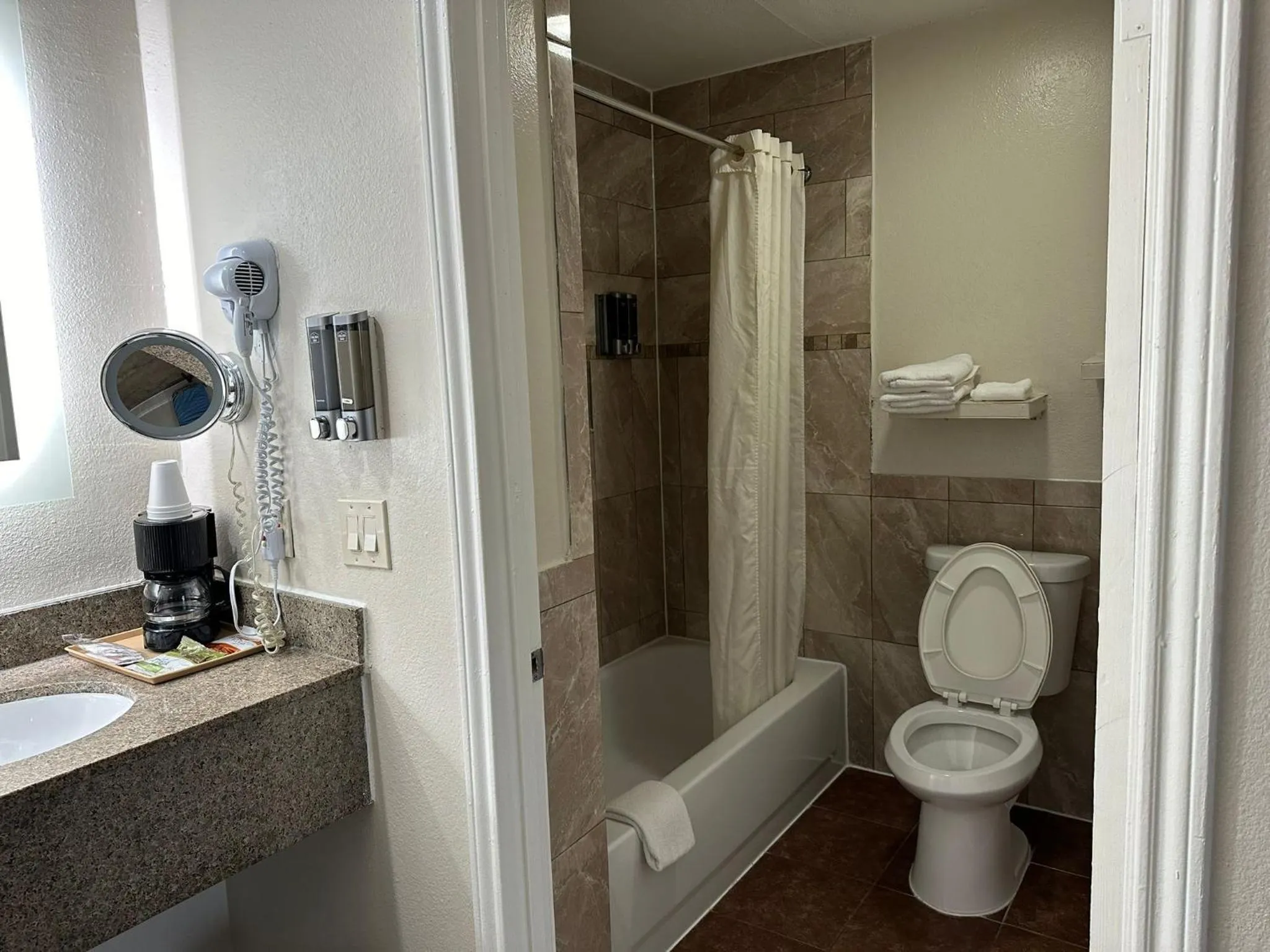 Toilet in Palace Inn I-45 & Bellfort