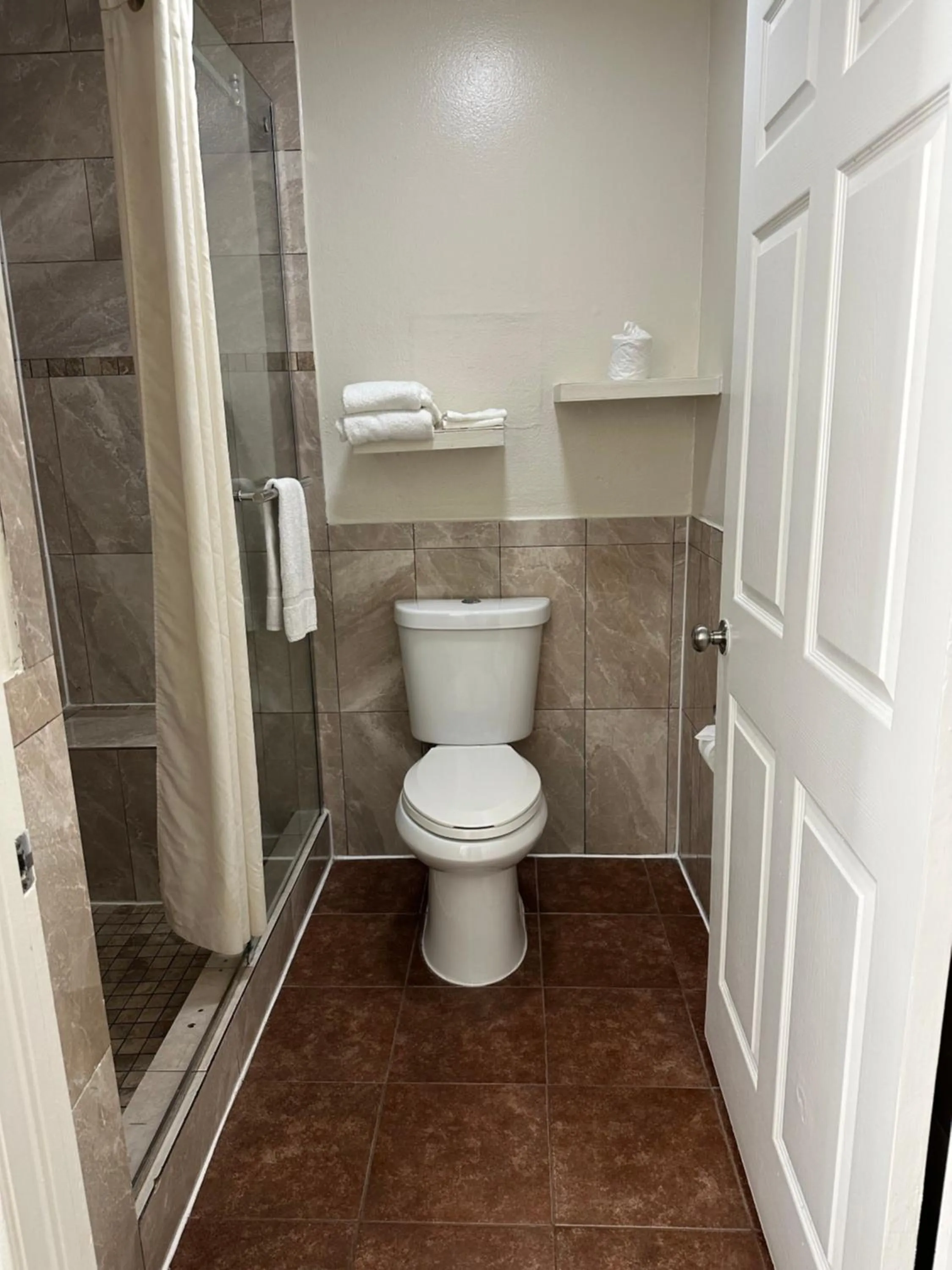 Toilet in Palace Inn I-45 & Bellfort