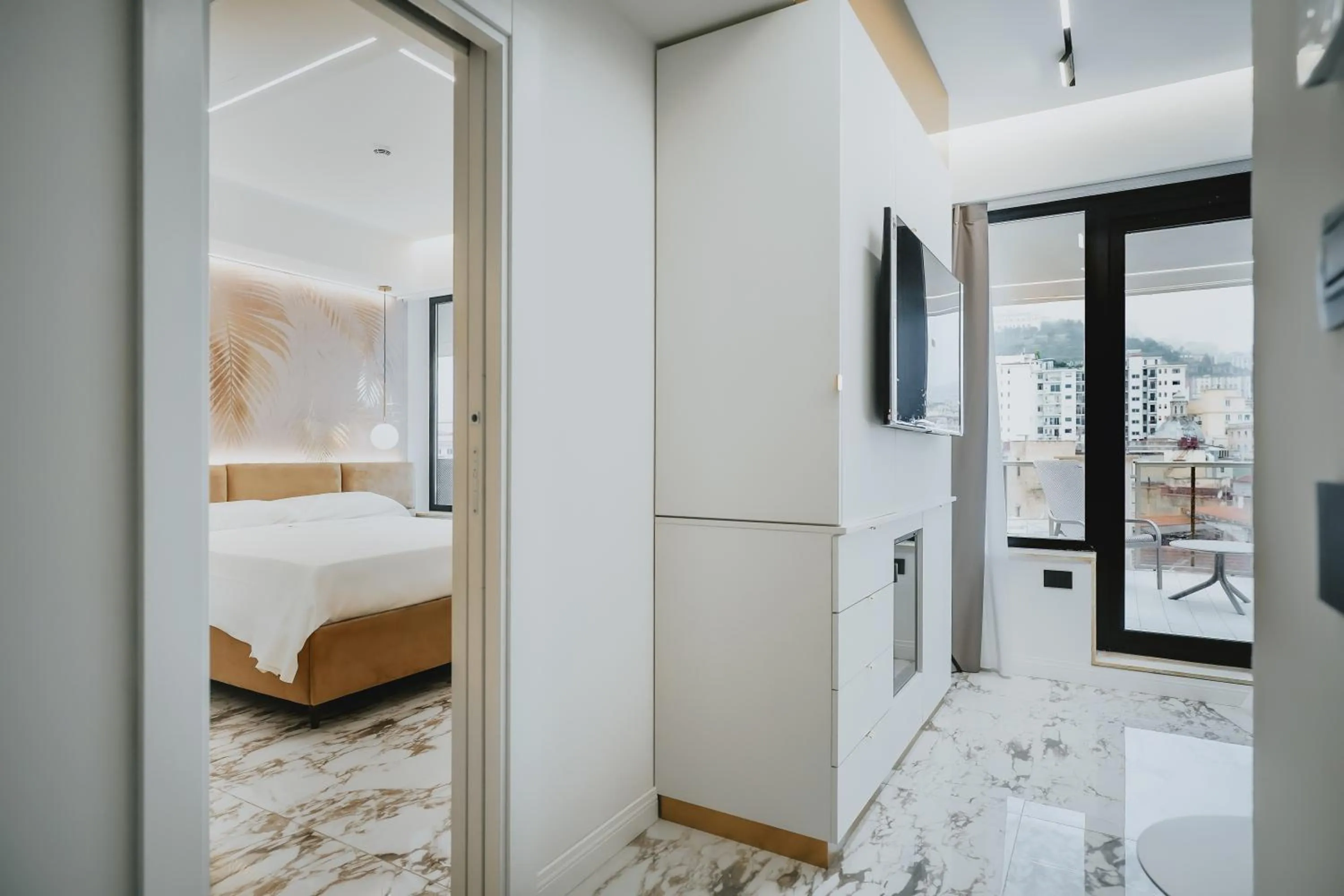 Bed in POETICA BOUTIQUE SKY HOTEL