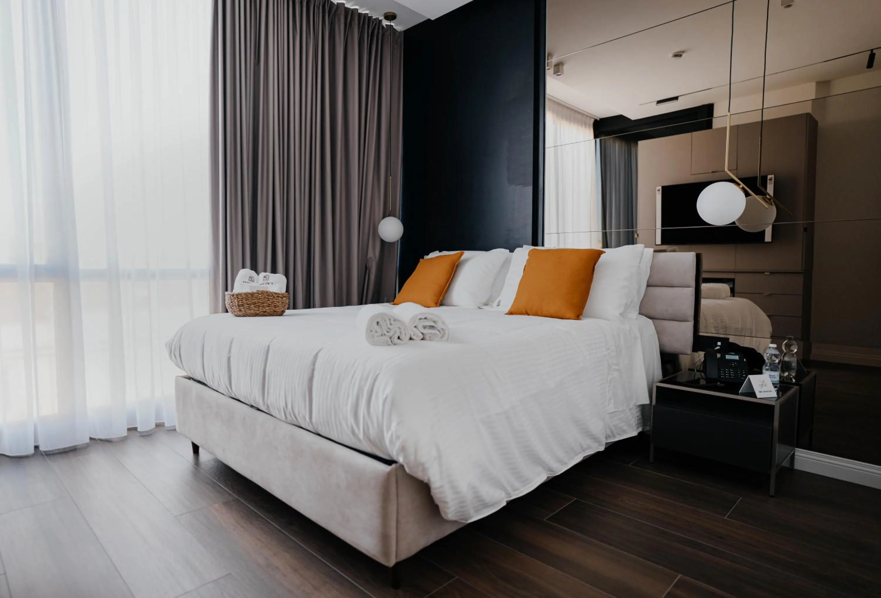 Bed in POETICA BOUTIQUE SKY HOTEL