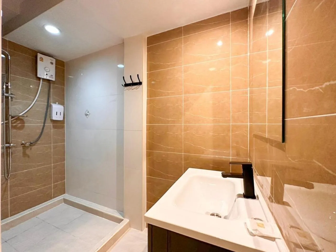 Shower in Thrive Hotel