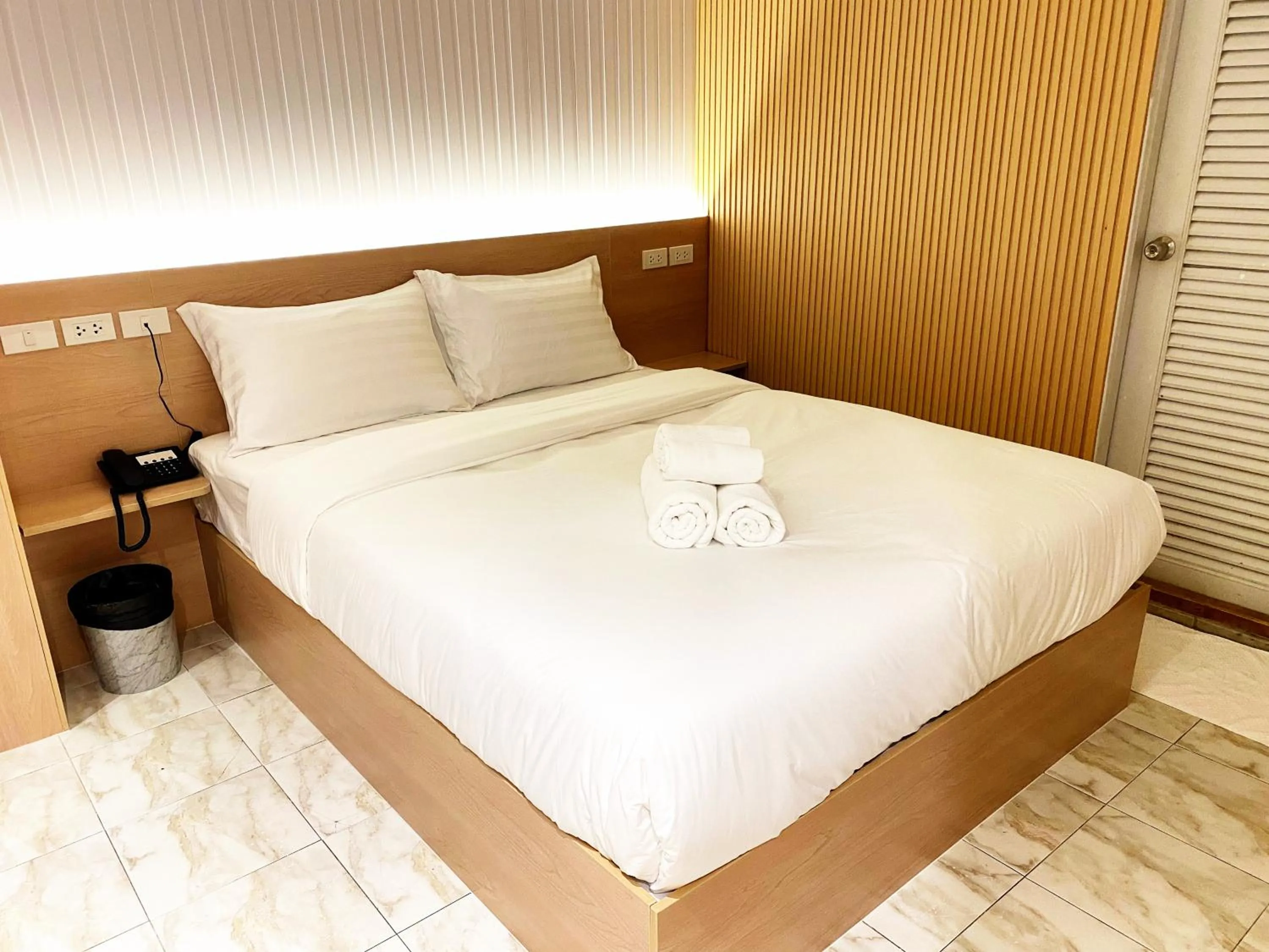 Bed in Thrive Hotel