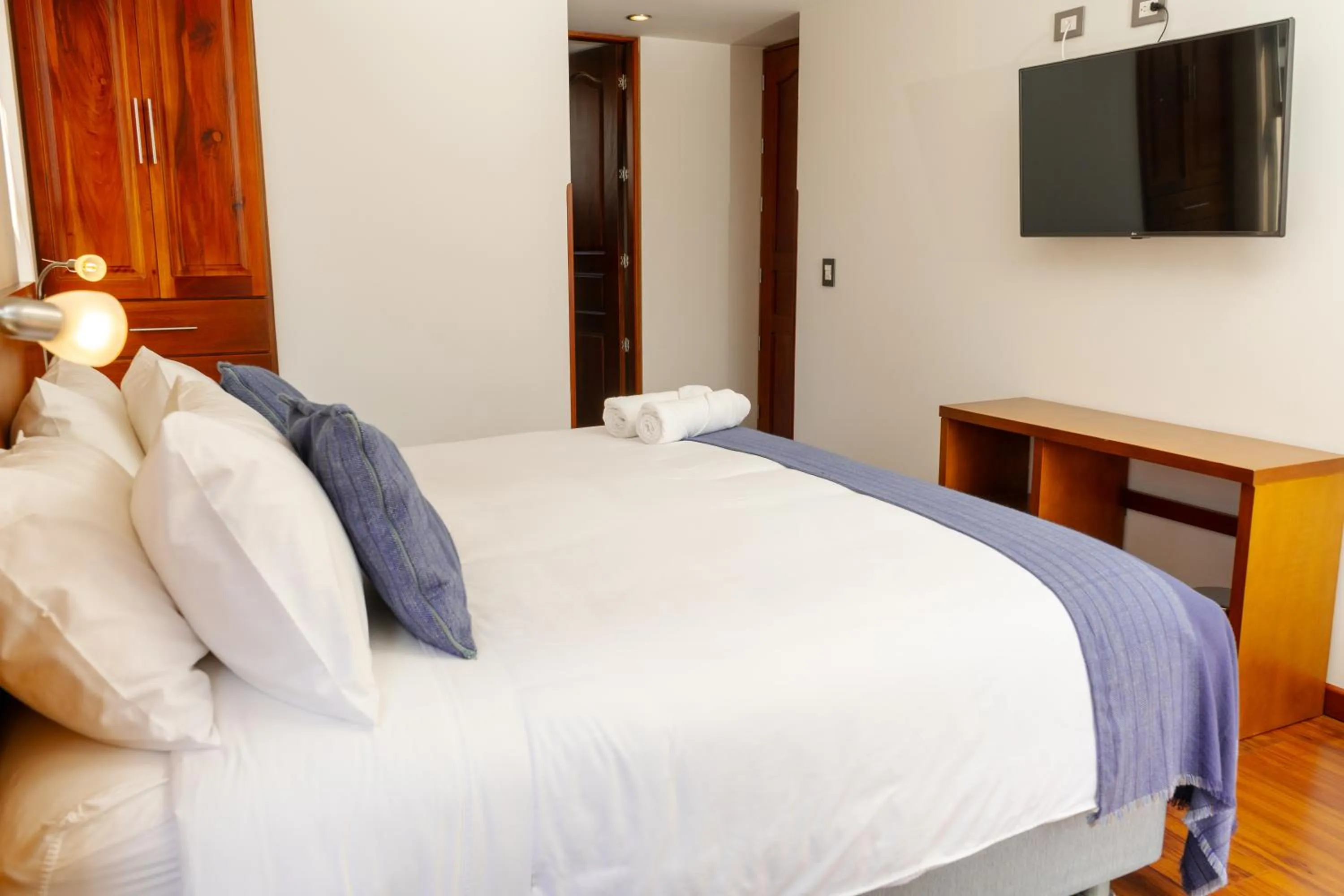 Bed in Samakwā Hotel Boutique