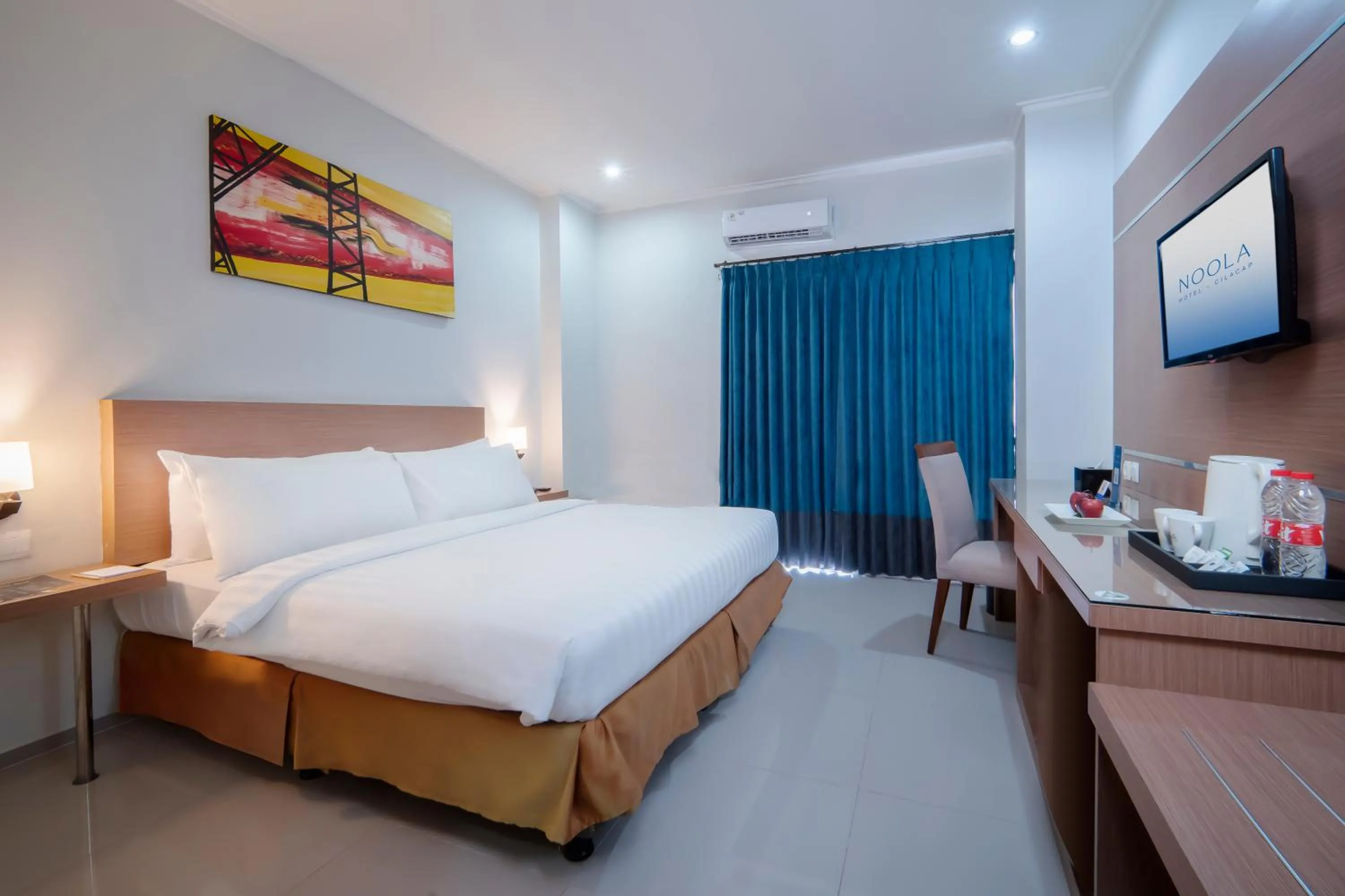 Bed in Noola Hotel Cilacap