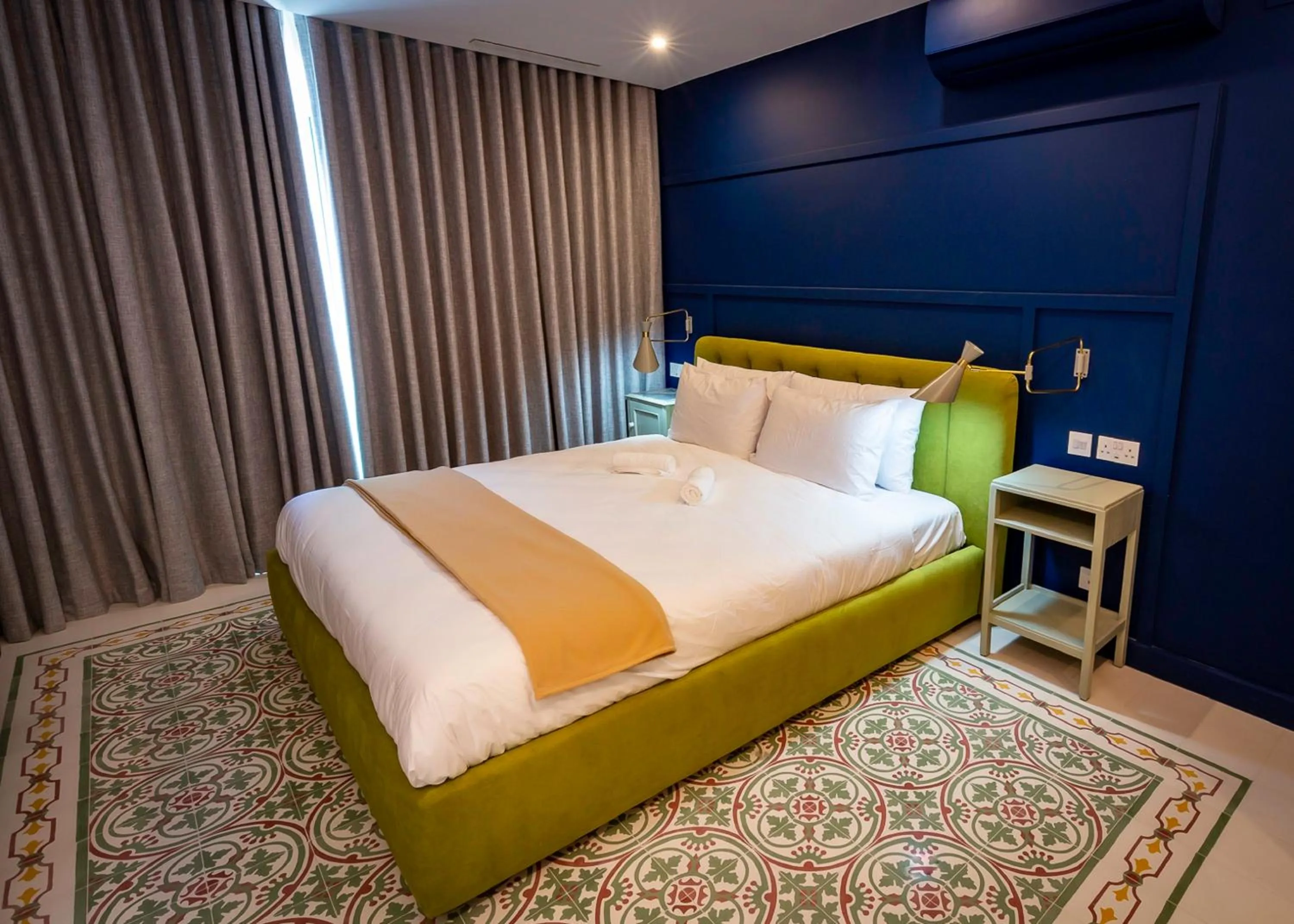 Bedroom in The Vincent Boutique Suites