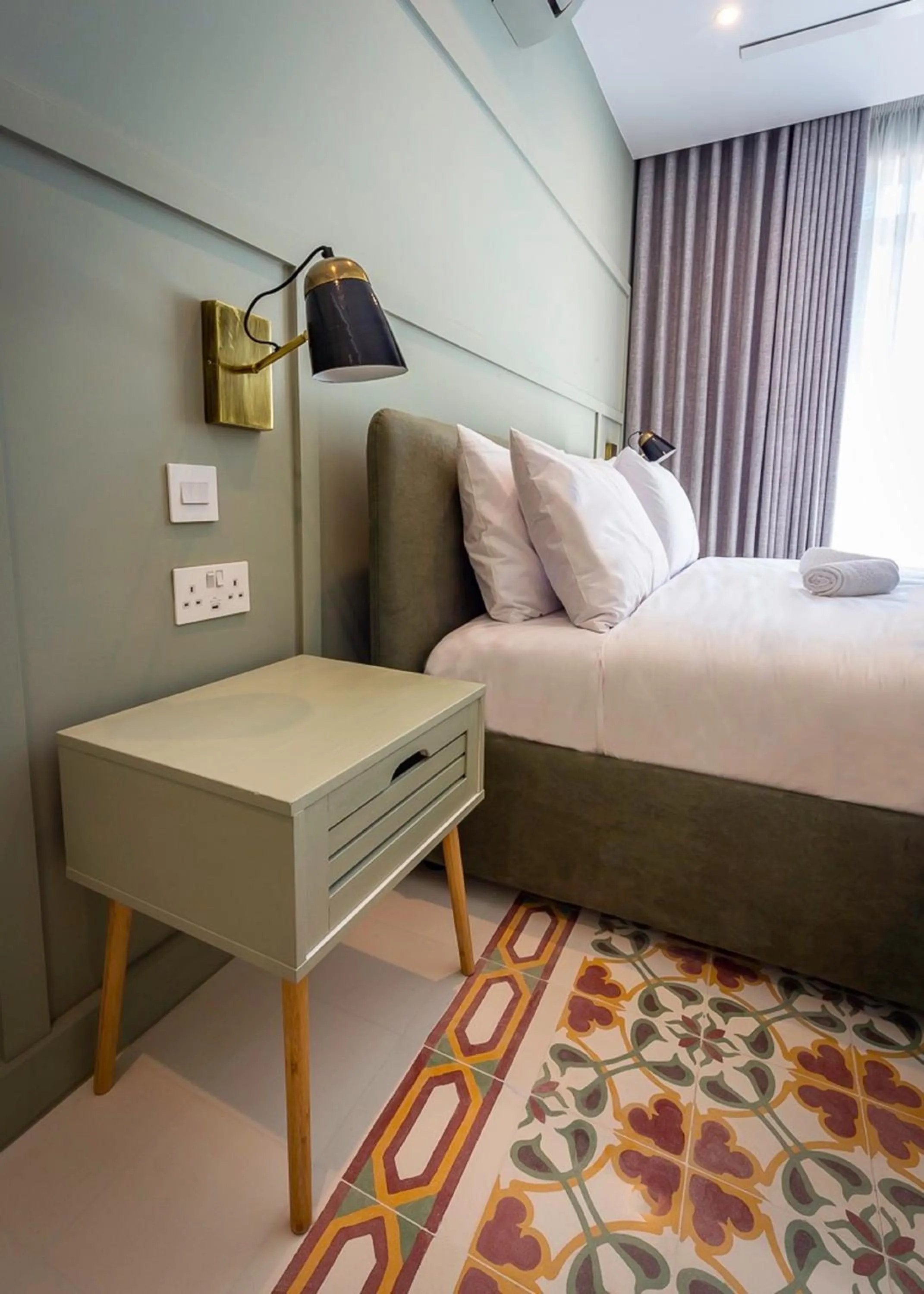 Bedroom in The Vincent Boutique Suites