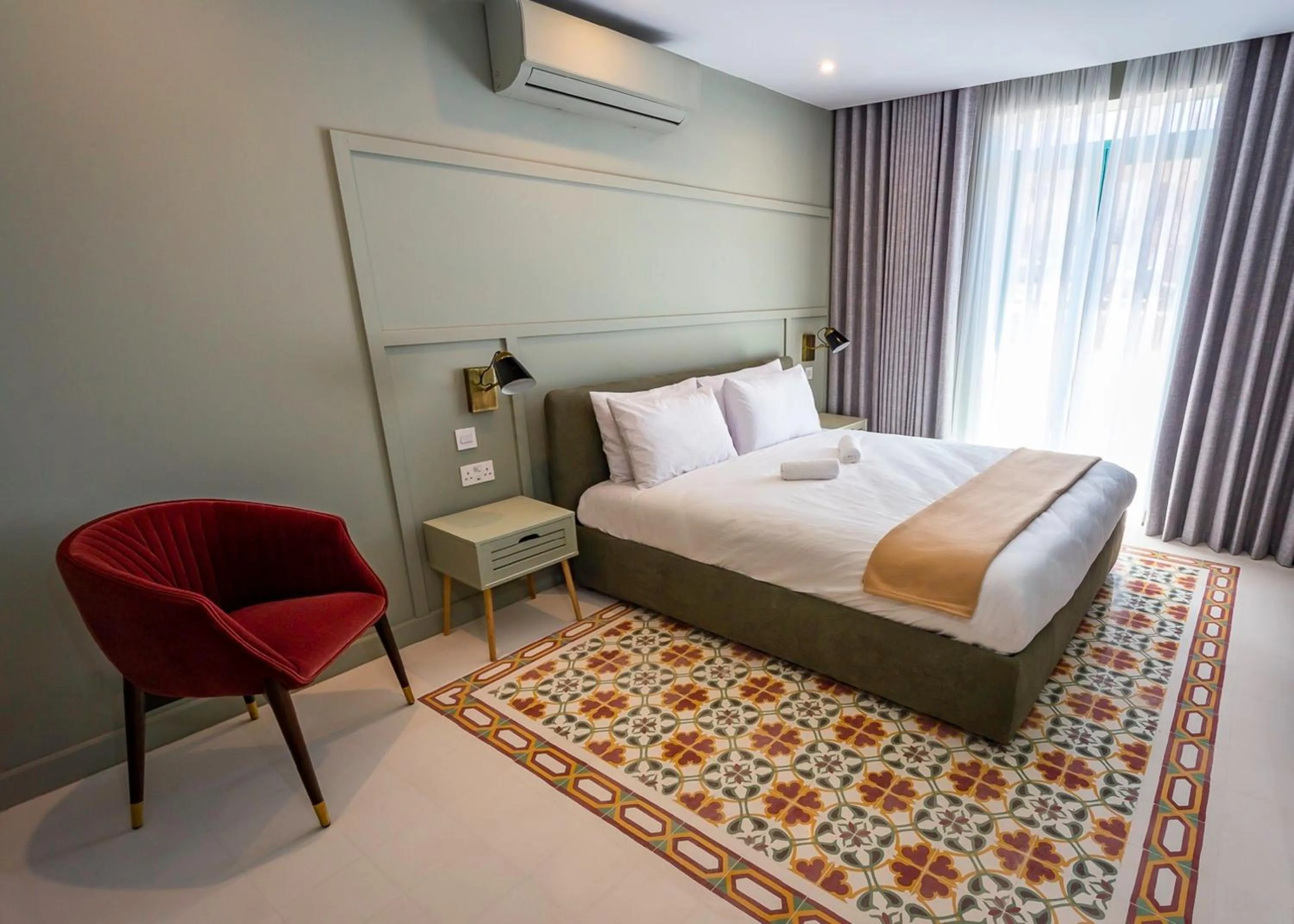 Bedroom in The Vincent Boutique Suites