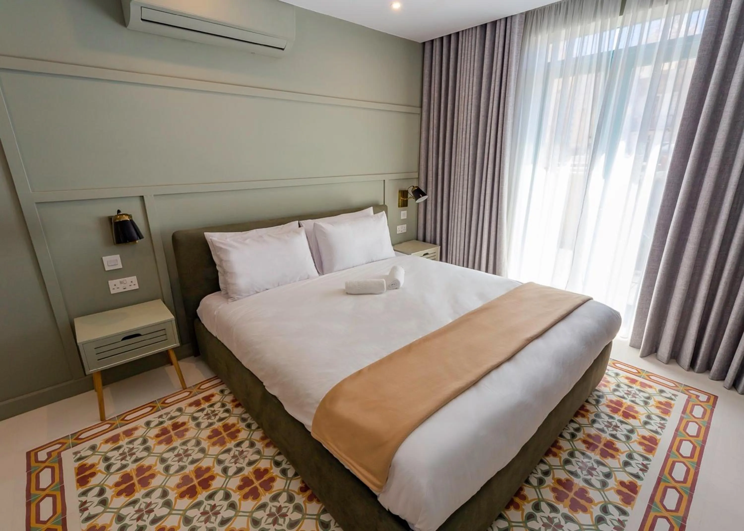 Bedroom in The Vincent Boutique Suites