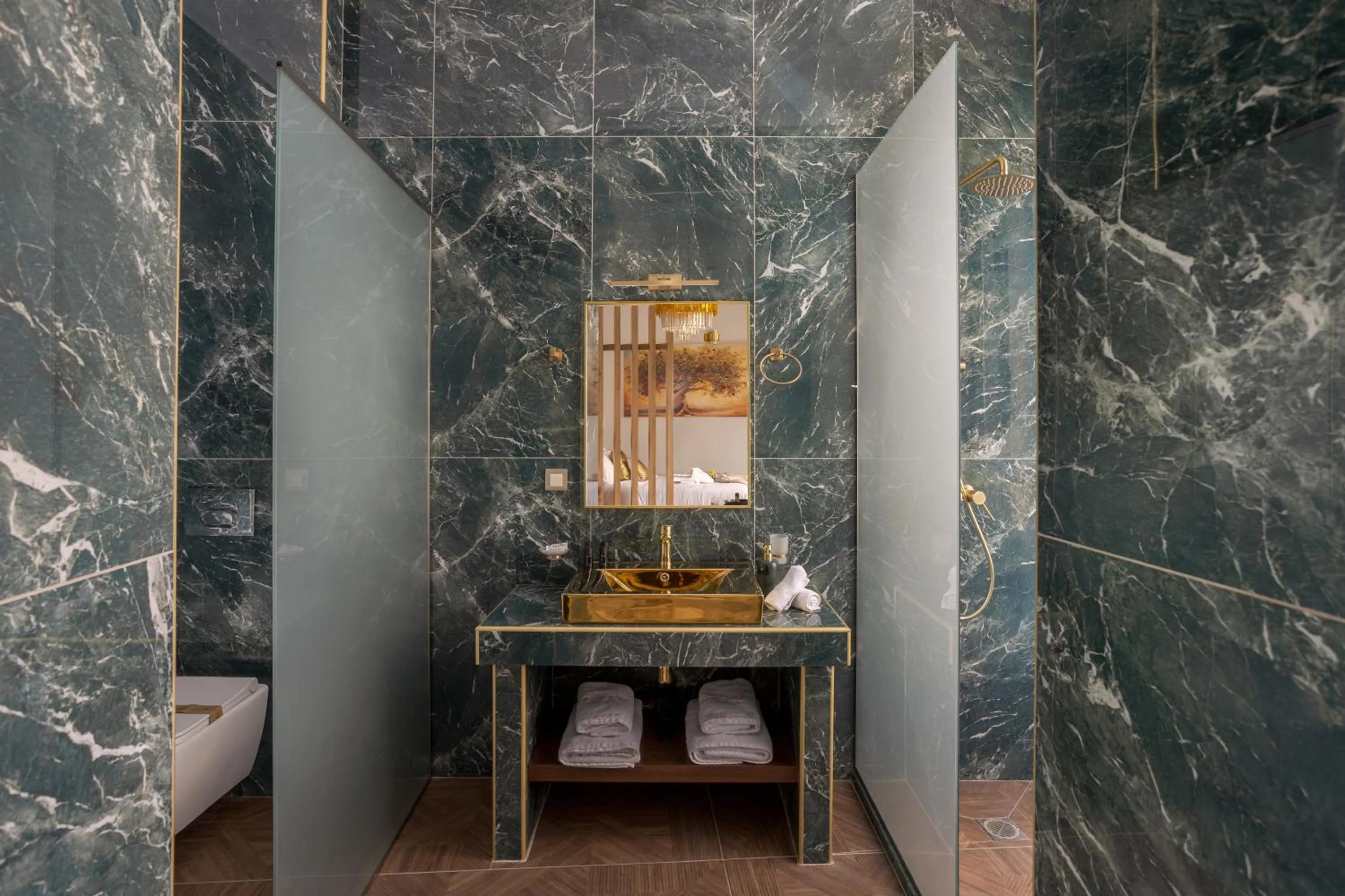 Bathroom in Royal Gold City Suites by Omilos Hotels