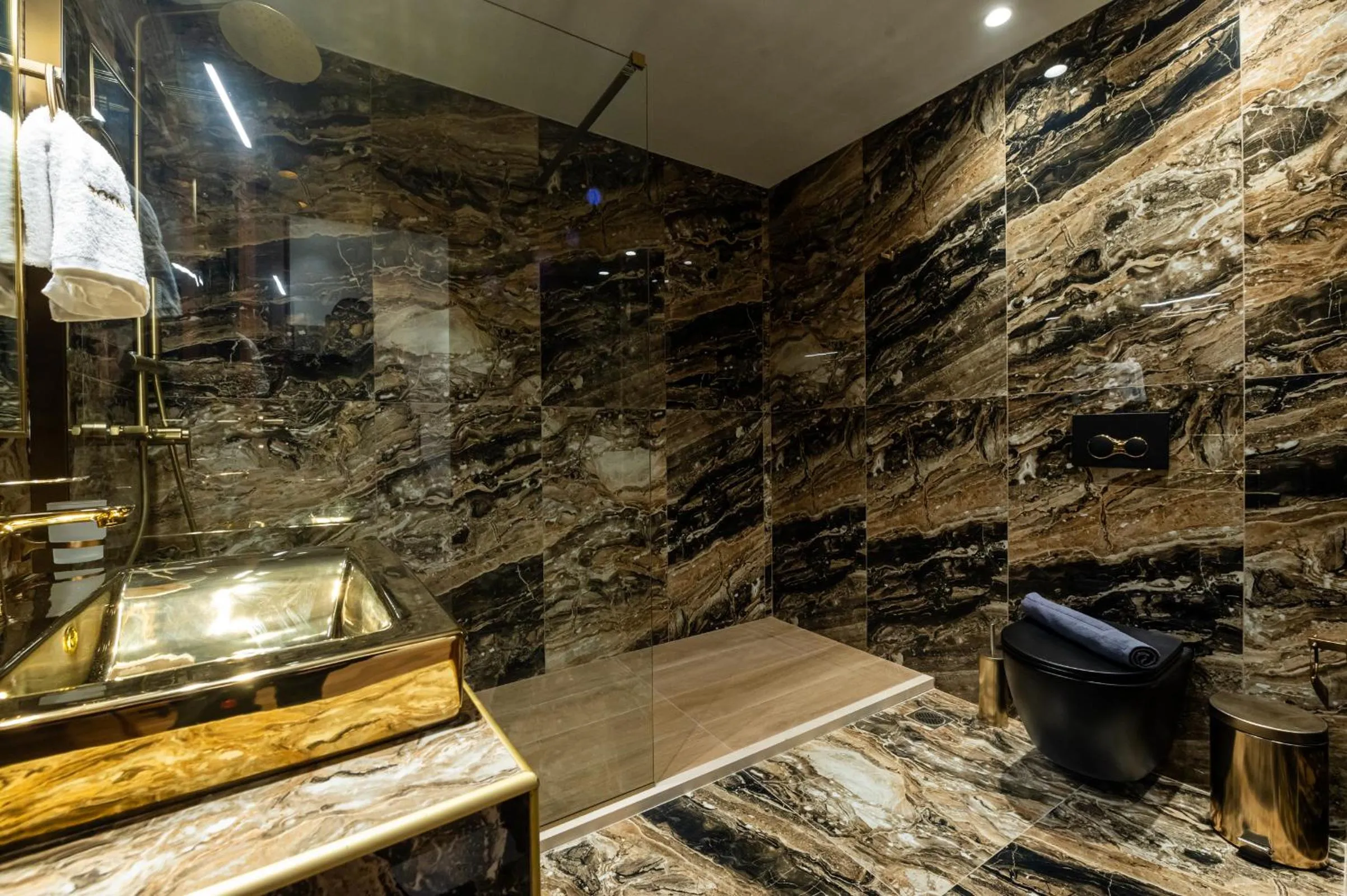 Shower in Royal Gold City Suites by Omilos Hotels